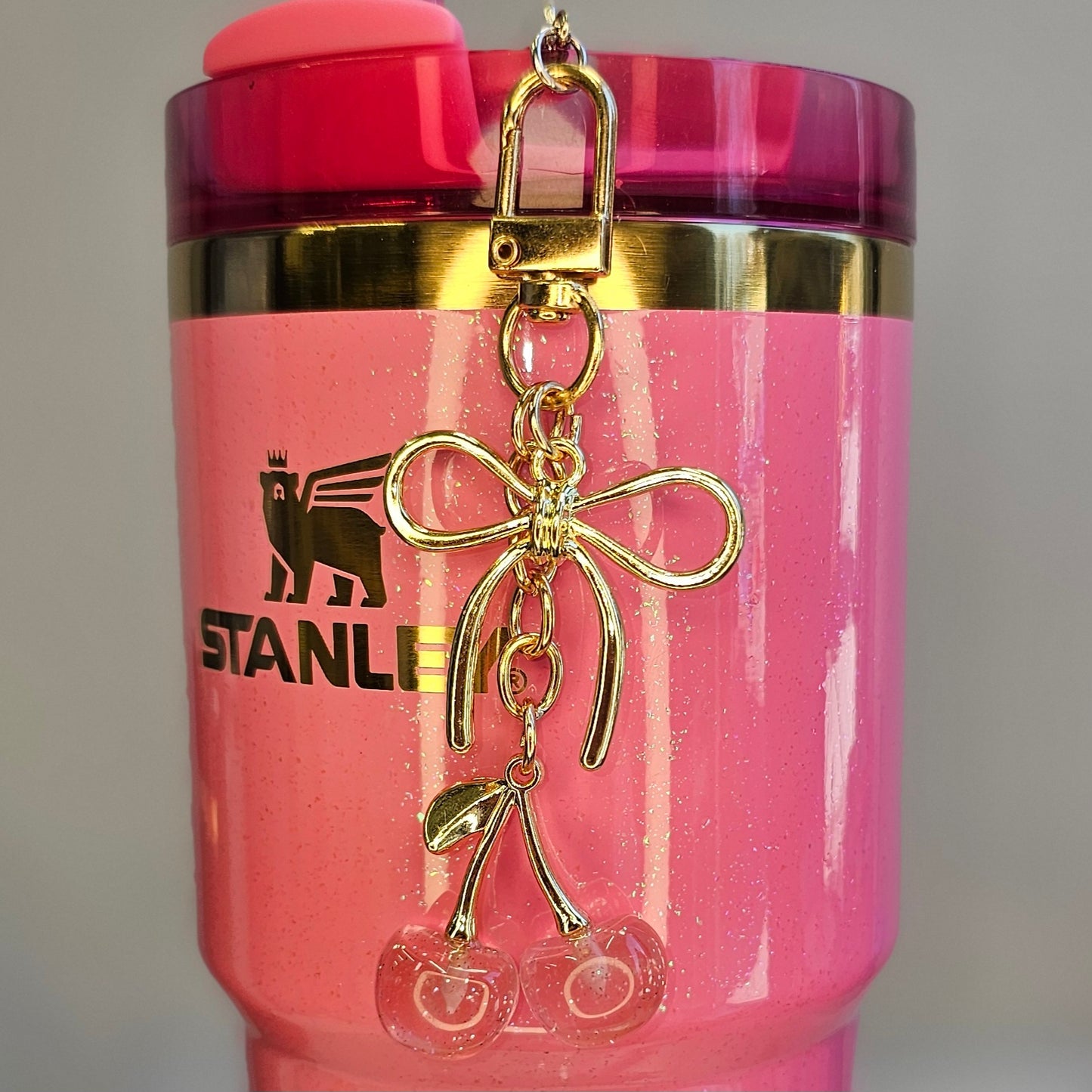 Pink Glitter Cherries and Gold Ribbon Bow Tumbler Straw Charm.