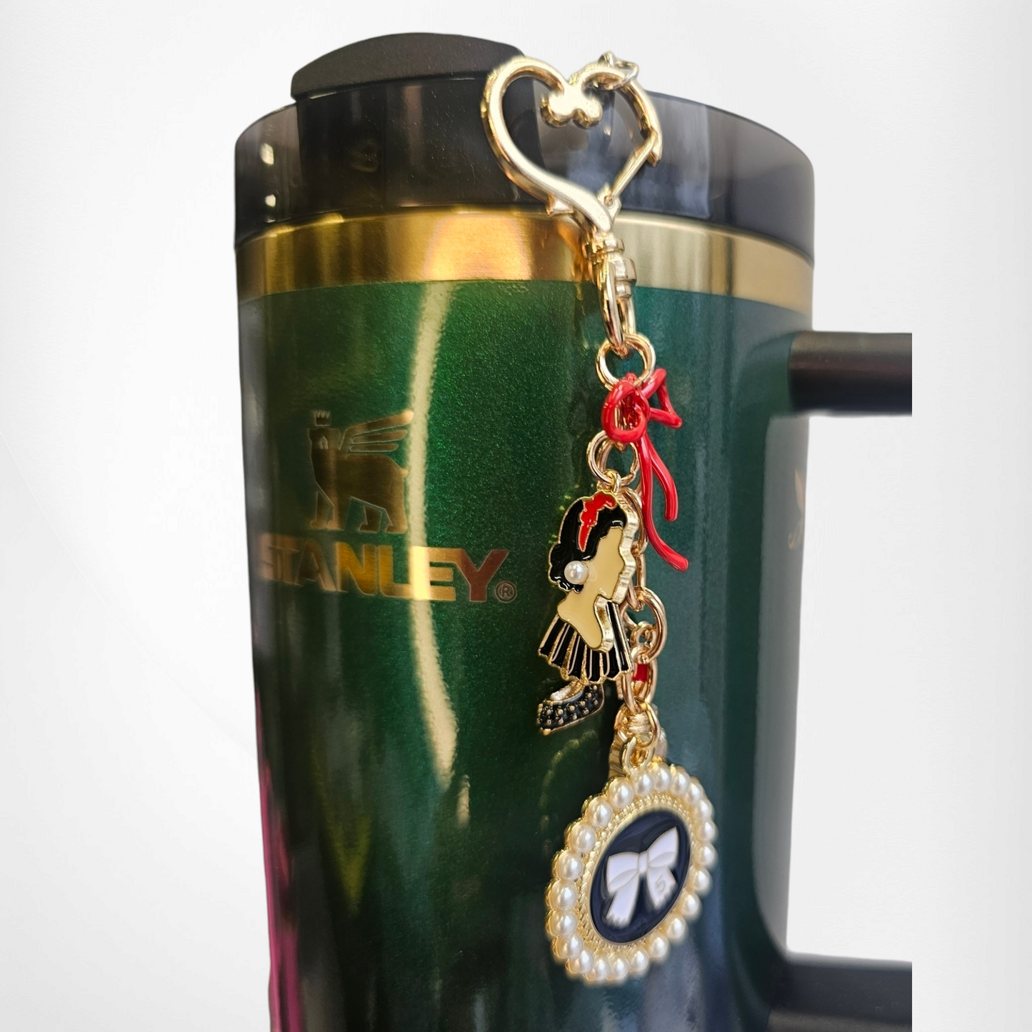 Luxury tumbler straw charm dangle for the classy Diva.
Colors are gold, black, white, and red.
Charms consist of glitter lipstick, glitter high heel, white pearl bow, red bow, and a cameo for the classy diva.