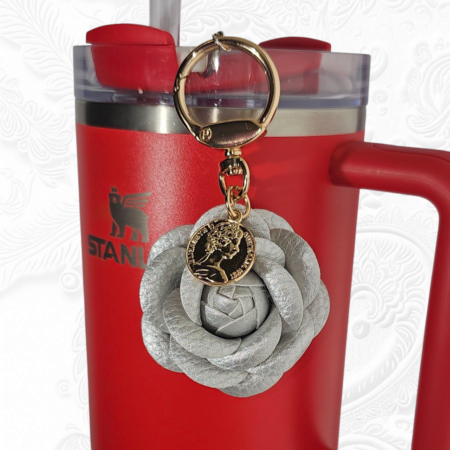 Luxury Silver Camelia flower with gold swivel keyring tumbler straw charm.
