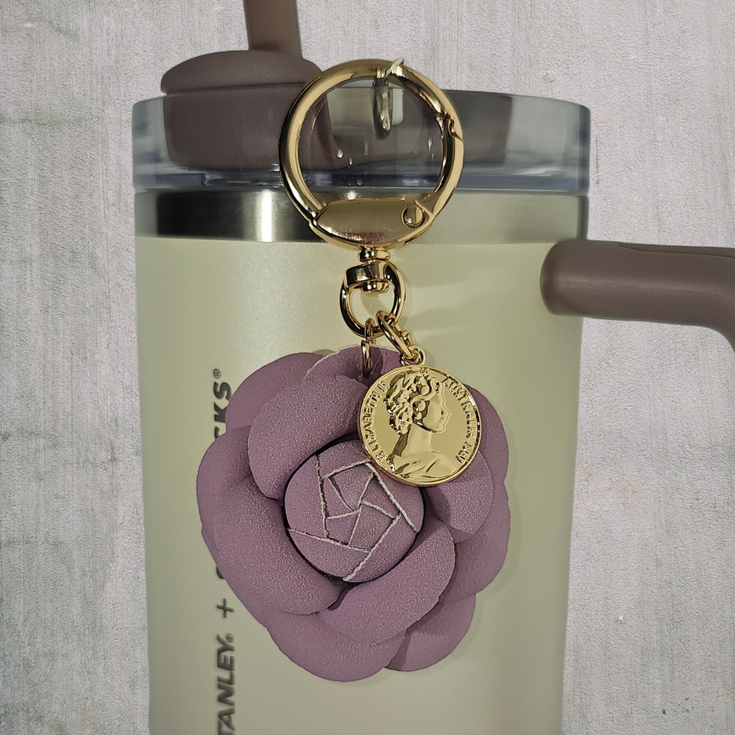 Lavender Purple Camelia flower with gold swivel keyring tumbler straw charm.