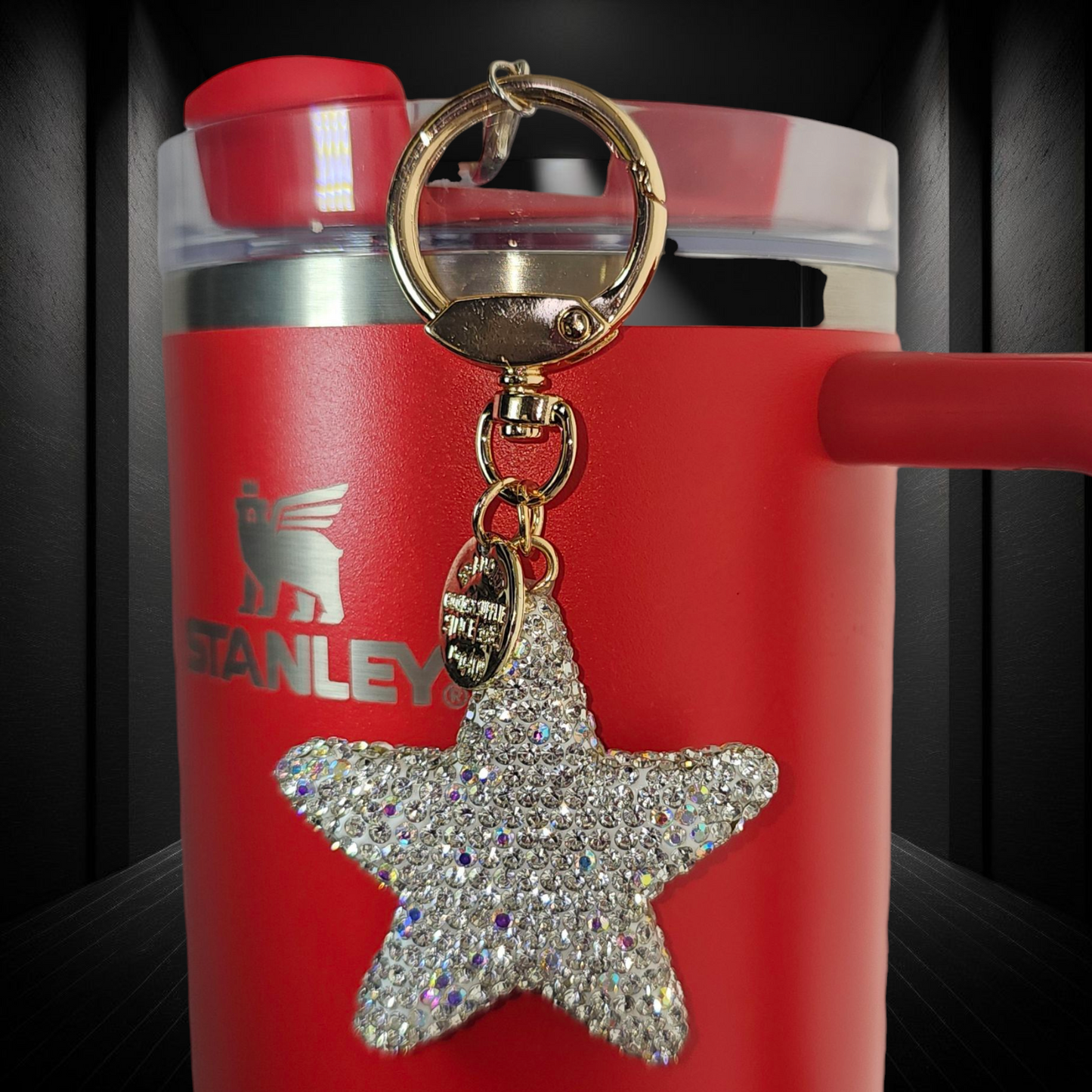 Silver Glitter star with gold swivel keyring tumbler straw charm.
