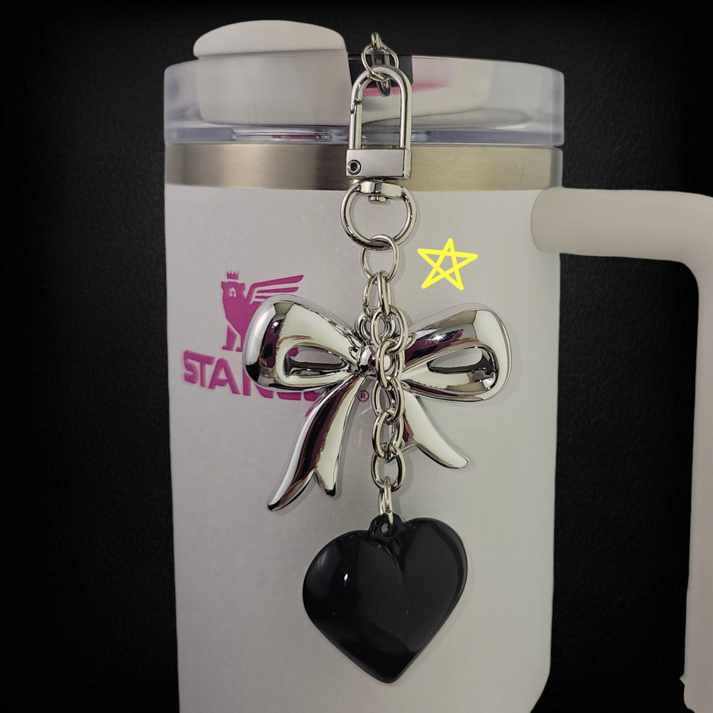 Ribbon Bow and Heary Tumbler Charms - Silver andBlack. Can also be used as a purse, bag, keychain, backpack, or cellphone charm. Heart has small blemishes.