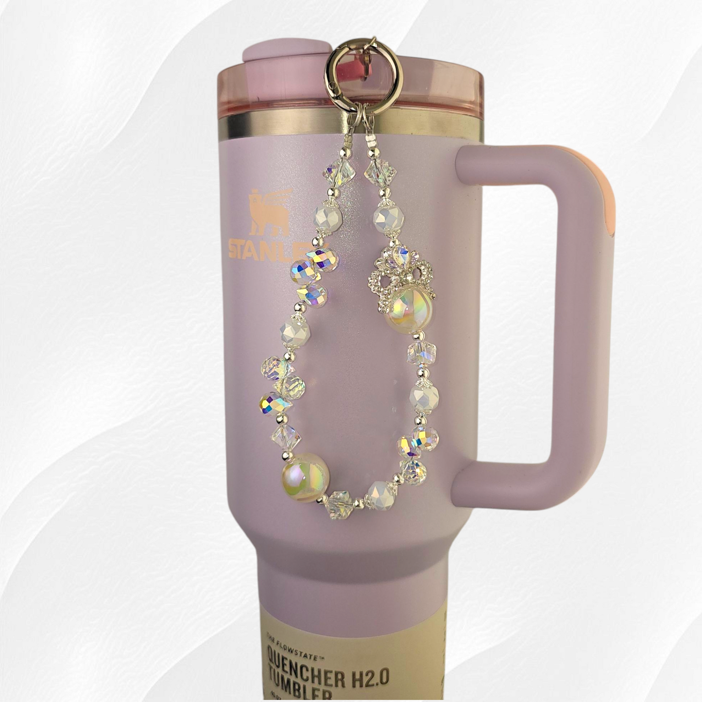 White and silver beaded tumbler charm.