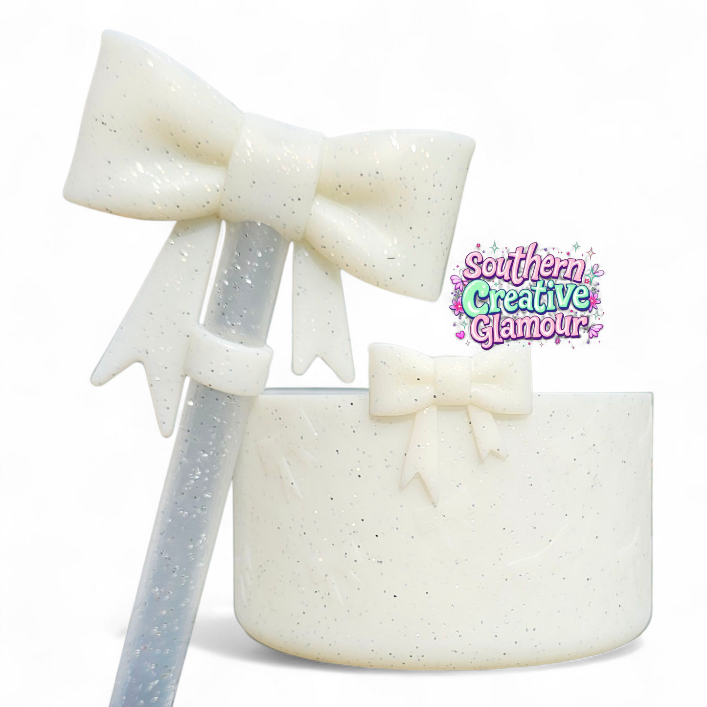 Creamy White glitter ribbon bow textured 3D silicone tumbler boot and matching 10mm bow straw topper.