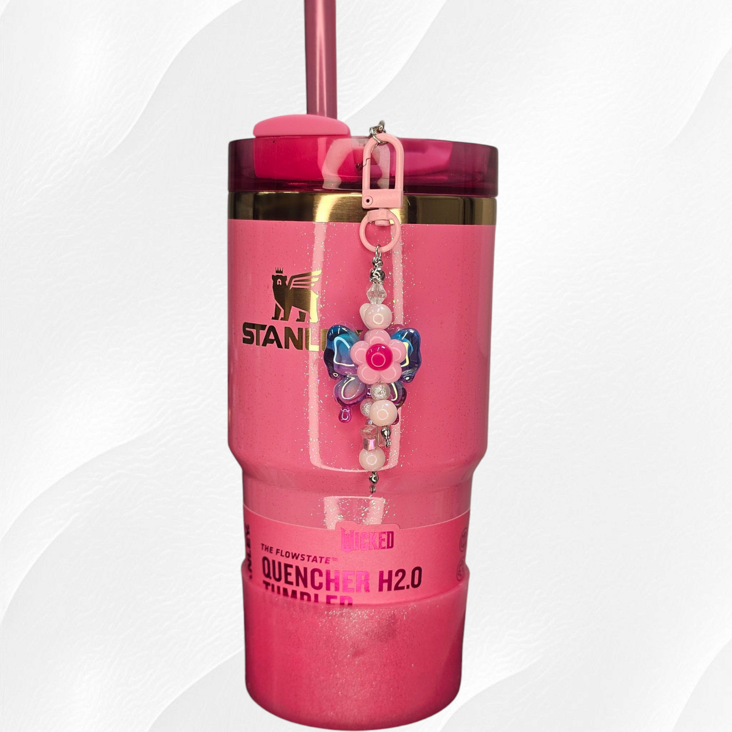 Irrelevant Pearlescent Purple and Blue Ombre Butterfly, Pink Daisy Flower, and Pink Beaded Charm Pendant.