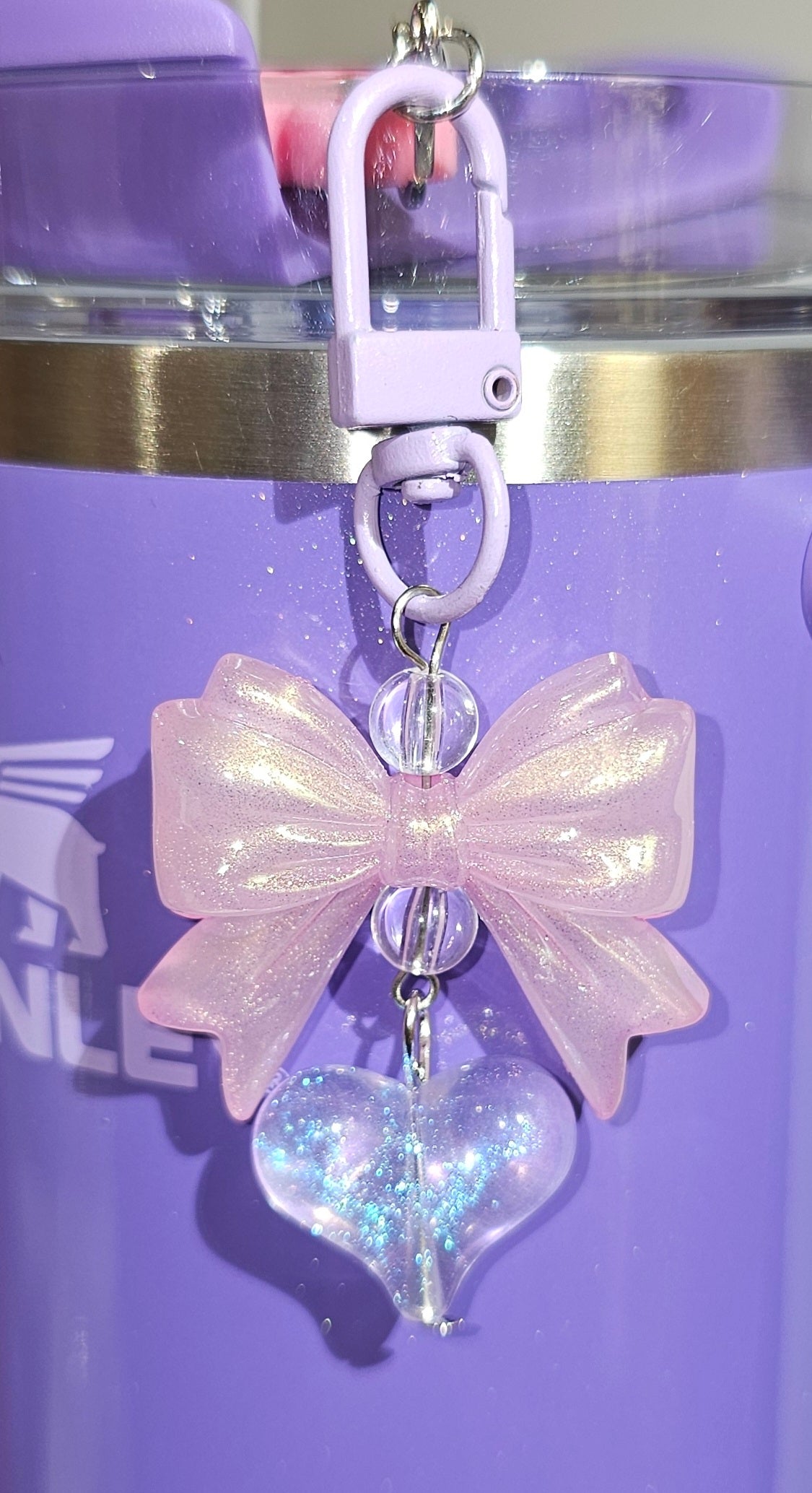 Iridescent Pearlescent Ribbon Bow and Heart Charm Pendant. Blush Pink and Lavender Purple Glitter.