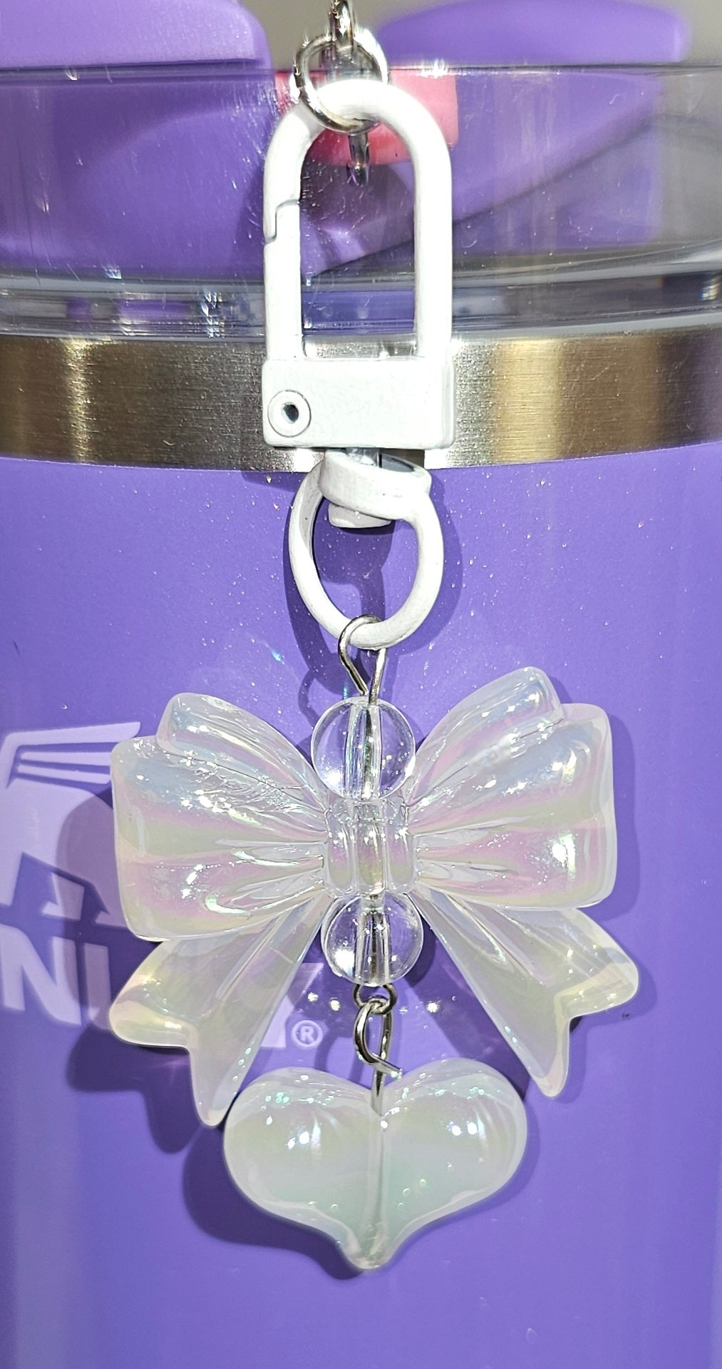 Iridescent Pearlescent Ribbon Bow and Heart Charm Pendant. Rainbow White