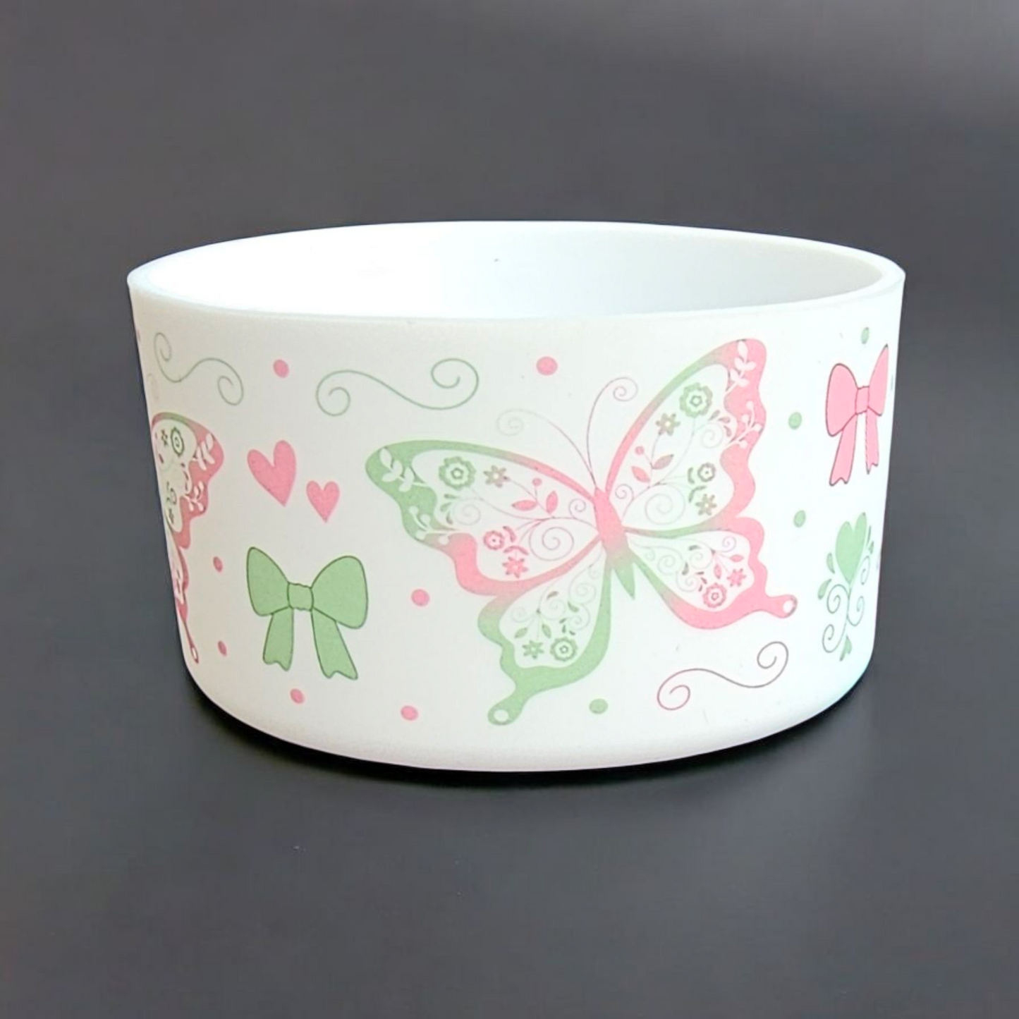 Pink and Green Butterflies, Coquette Bows, and Hearts on a White Silicone Tumbler Boot by Southern Creative Glamour