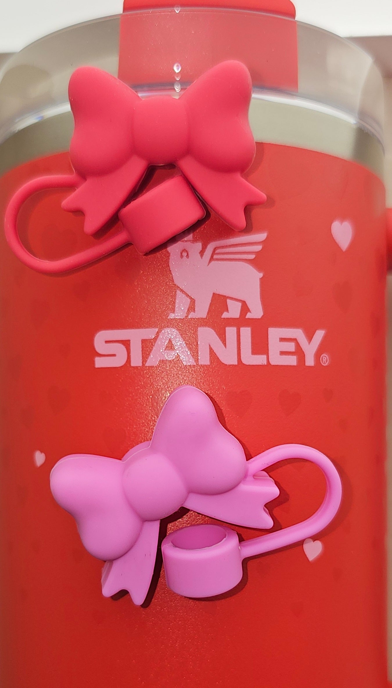 Sweetheart Pink and Ruby Red Heart Butterfly Ribbon Bow 3D Silicone Straw Topper - Straw Cover - Straw Topper. Pictured with Target Exclusive Valentine's Day Stanley Ruby Hearts.