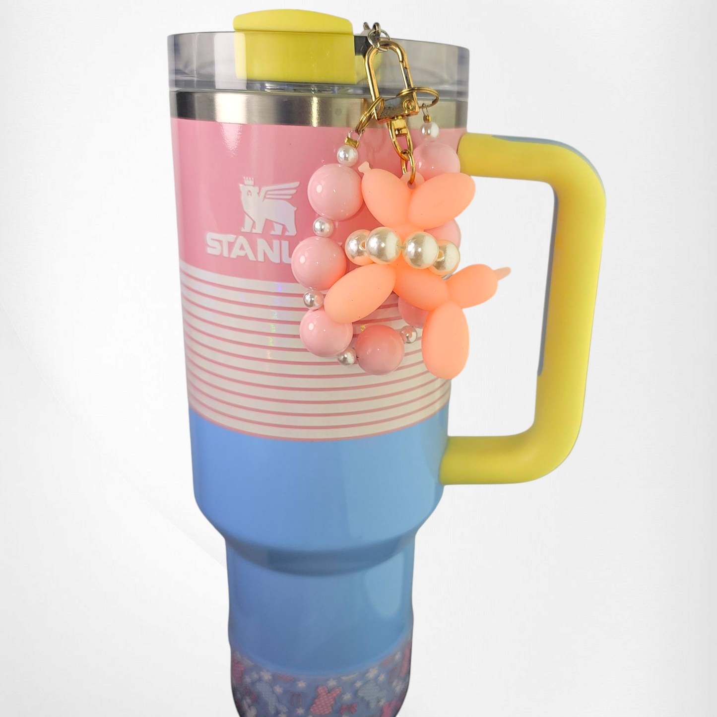 Pink Balloon Dog wearing a white pearl beaded necklace with a pink beaded charm bracelet. Use as a tumbler, purse, or keychain charm.