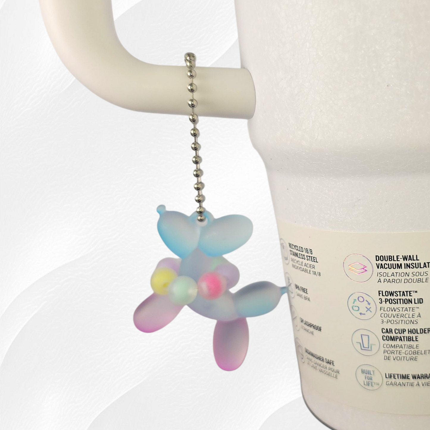Purple & blue Ombre Balloon Dog wearing a beaded necklace tumbler charm.