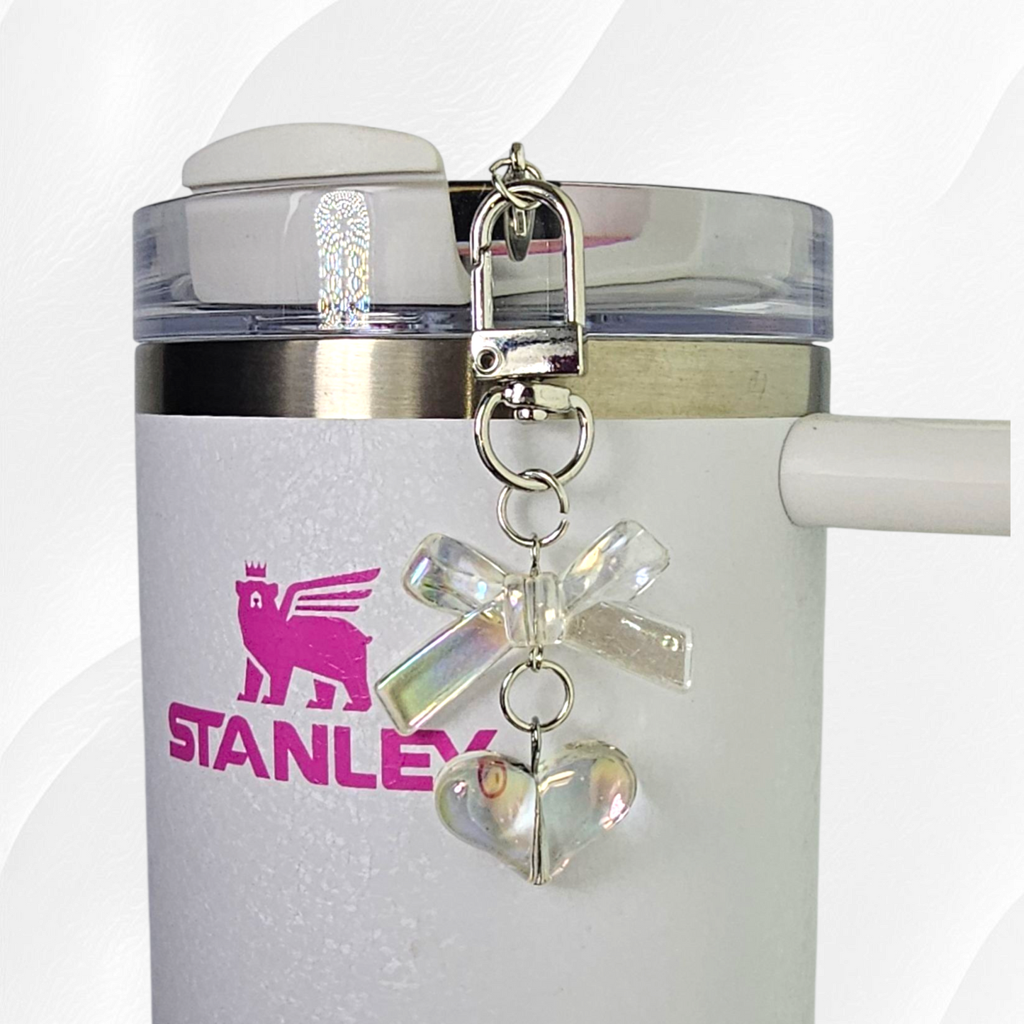 Clear iridescent heart and bow charm