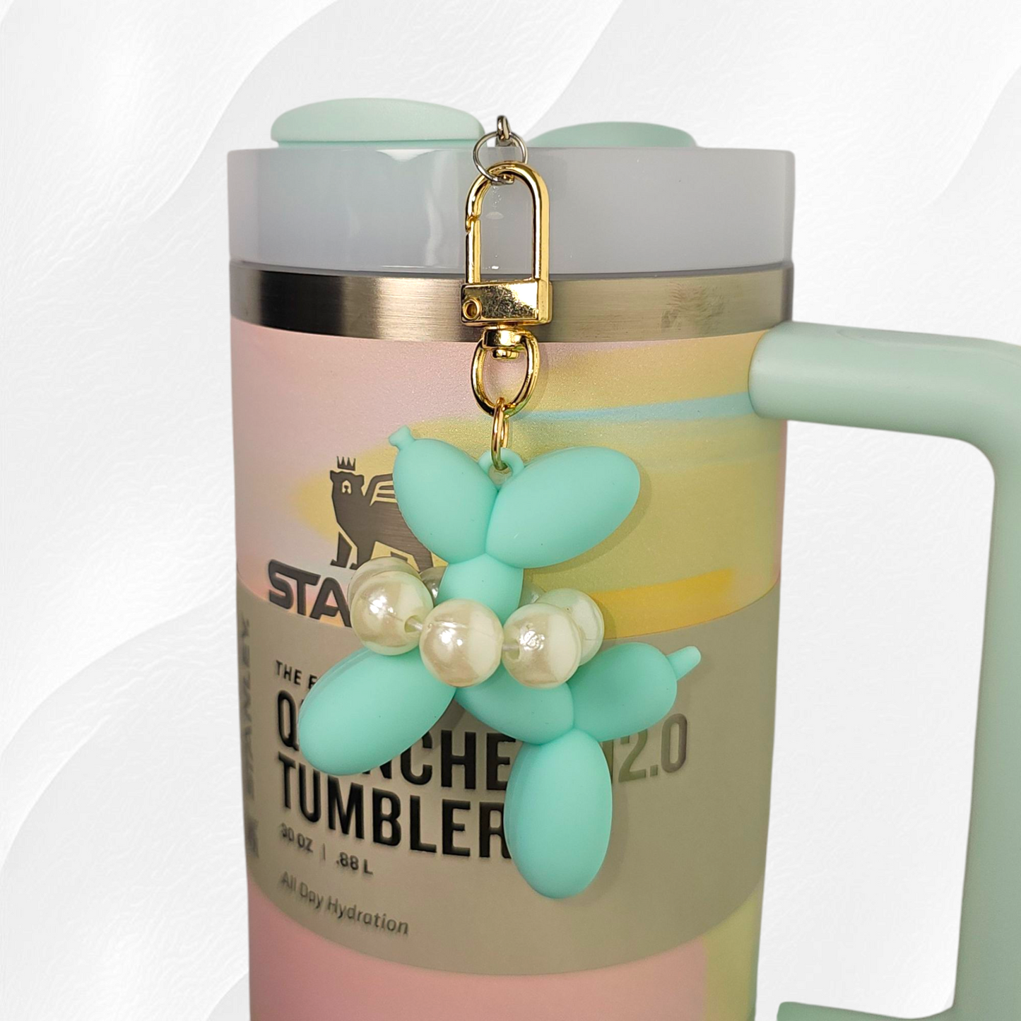 Mint Green Silicone Balloon Dog and gold swivel lobster clasp tumbler charm.