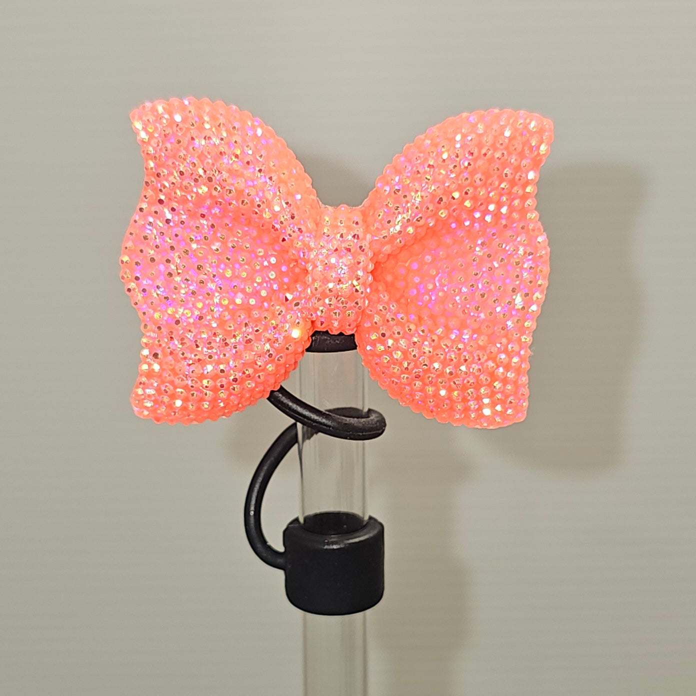 Coral Pink Glitter Bow with black Silicone Straw Topper base. Straw Cover - Straw Topper