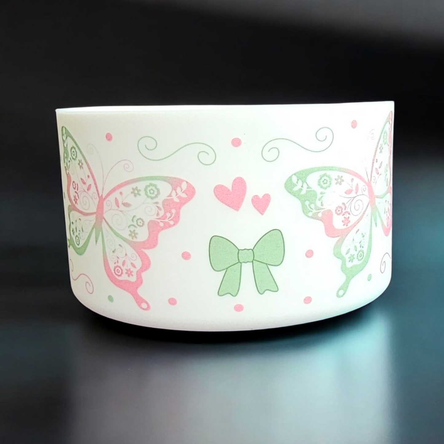 Pink and Green Butterflies, Coquette Bows, and Hearts on a White Silicone Tumbler Boot by Southern Creative Glamour