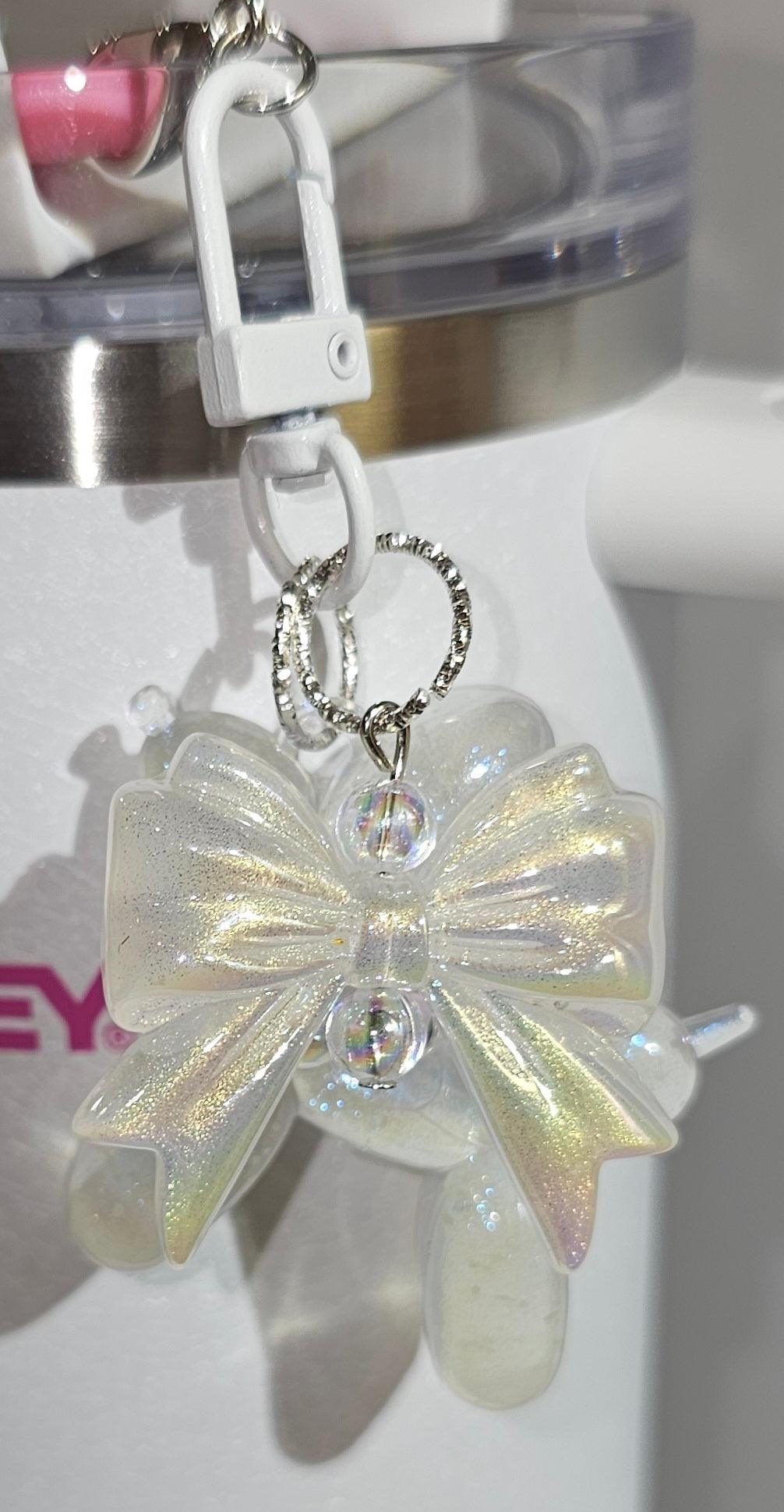 Clear Glow in the Dark Iridescent Pearlescent Glitter Balloon Dog with Croquet Ribbon Bow Charm Pendant for Stanley, Brumate, Simple Modern, Yeti, Hydroflask, Hydrojug, Mini Stanley, Kid's Cup, Kid's Tumbler, Purse, Keychain, or Backpack. 
