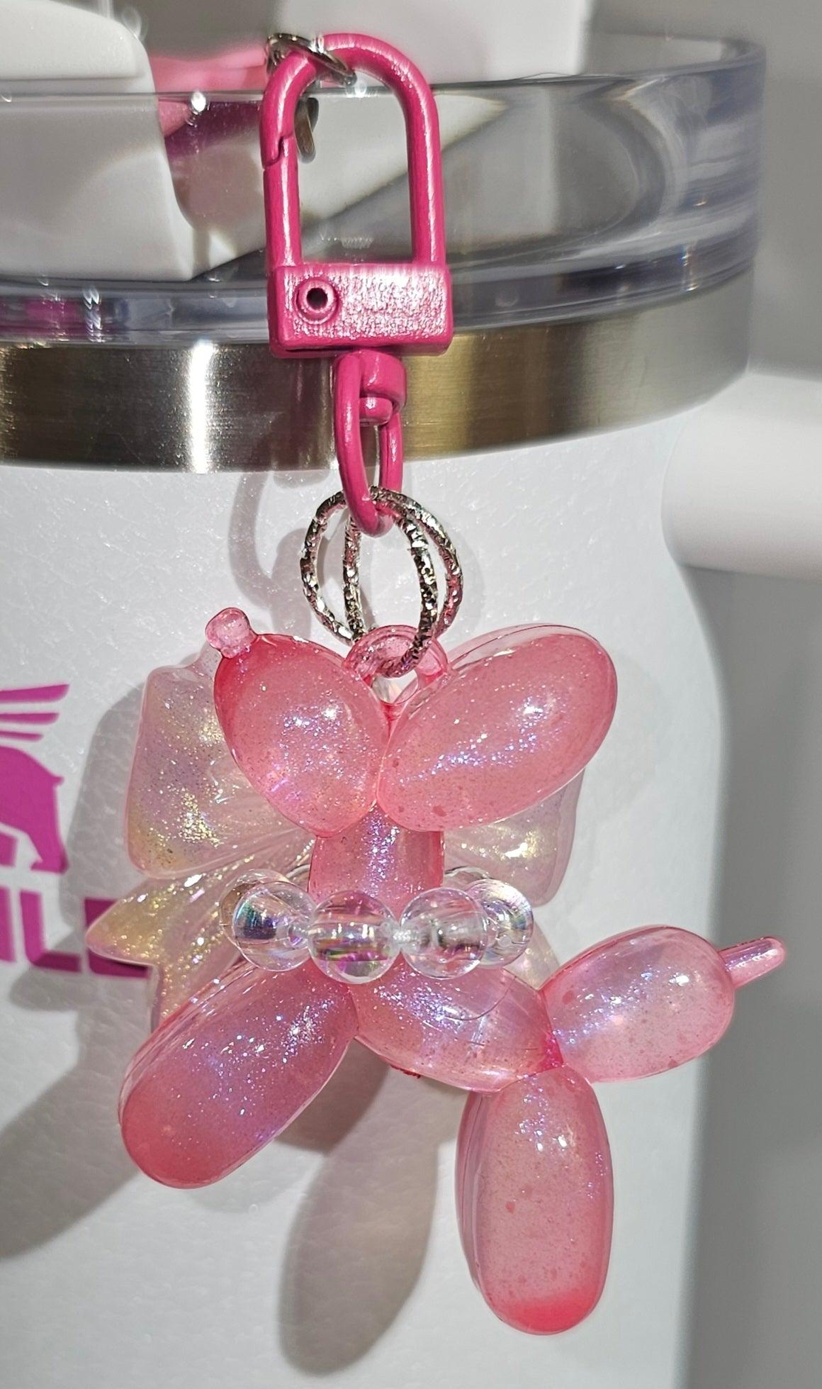 Wicked Glinda Pink / Winter Pink  / Barbie Pink Glow in the Dark Iridescent Pearlescent Glitter Balloon Dog with Croquet Ribbon Bow Charm Pendant for Stanley, Brumate, Simple Modern, Yeti, Hydroflask, Hydrojug, Mini Stanley, Kid's Cup, Kid's Tumbler, Purse, Keychain, or Backpack. 