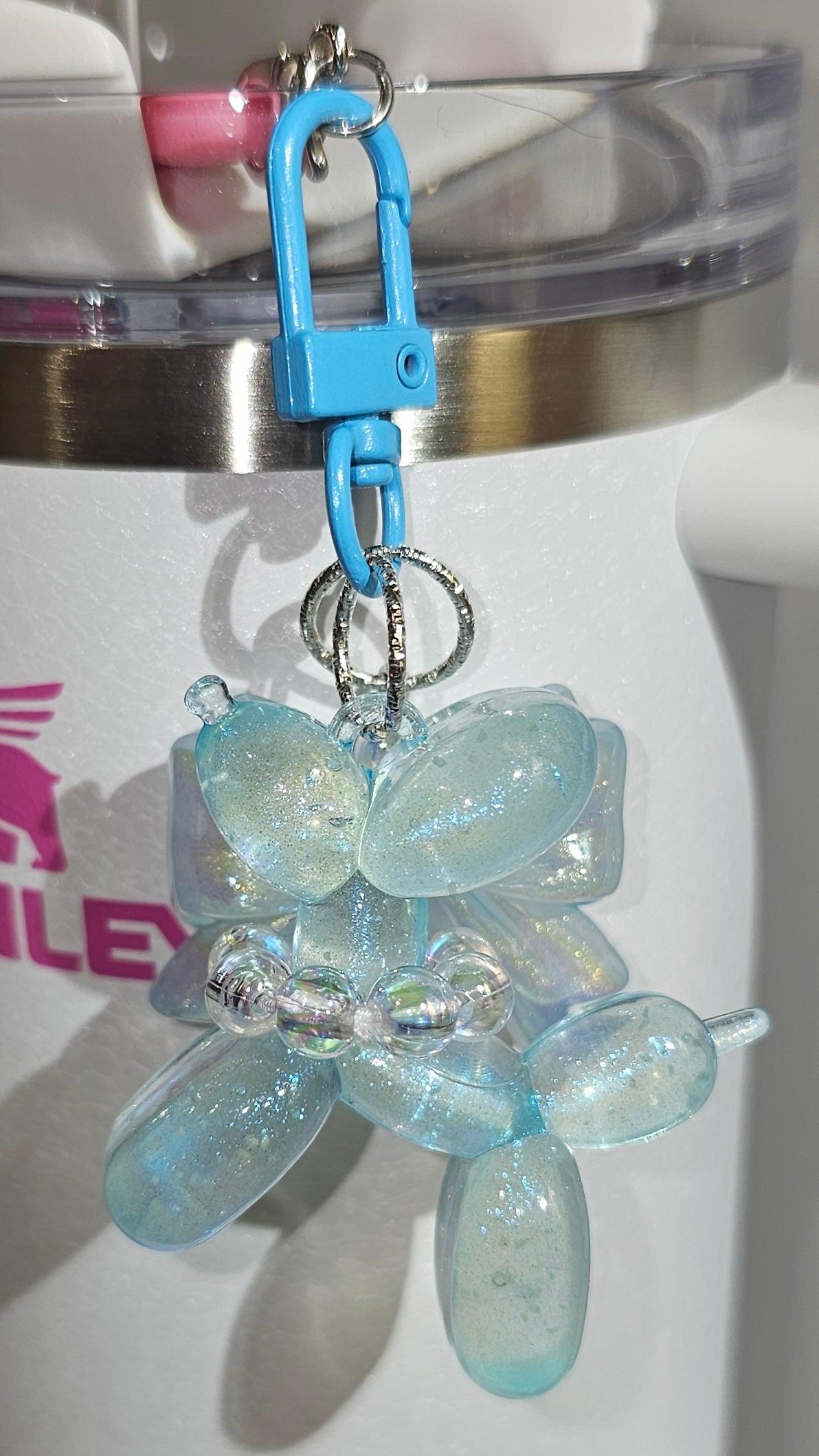 Powder Blue Crush Glow in the Dark Iridescent Pearlescent Glitter Balloon Dog with Croquet Ribbon Bow Charm Pendant