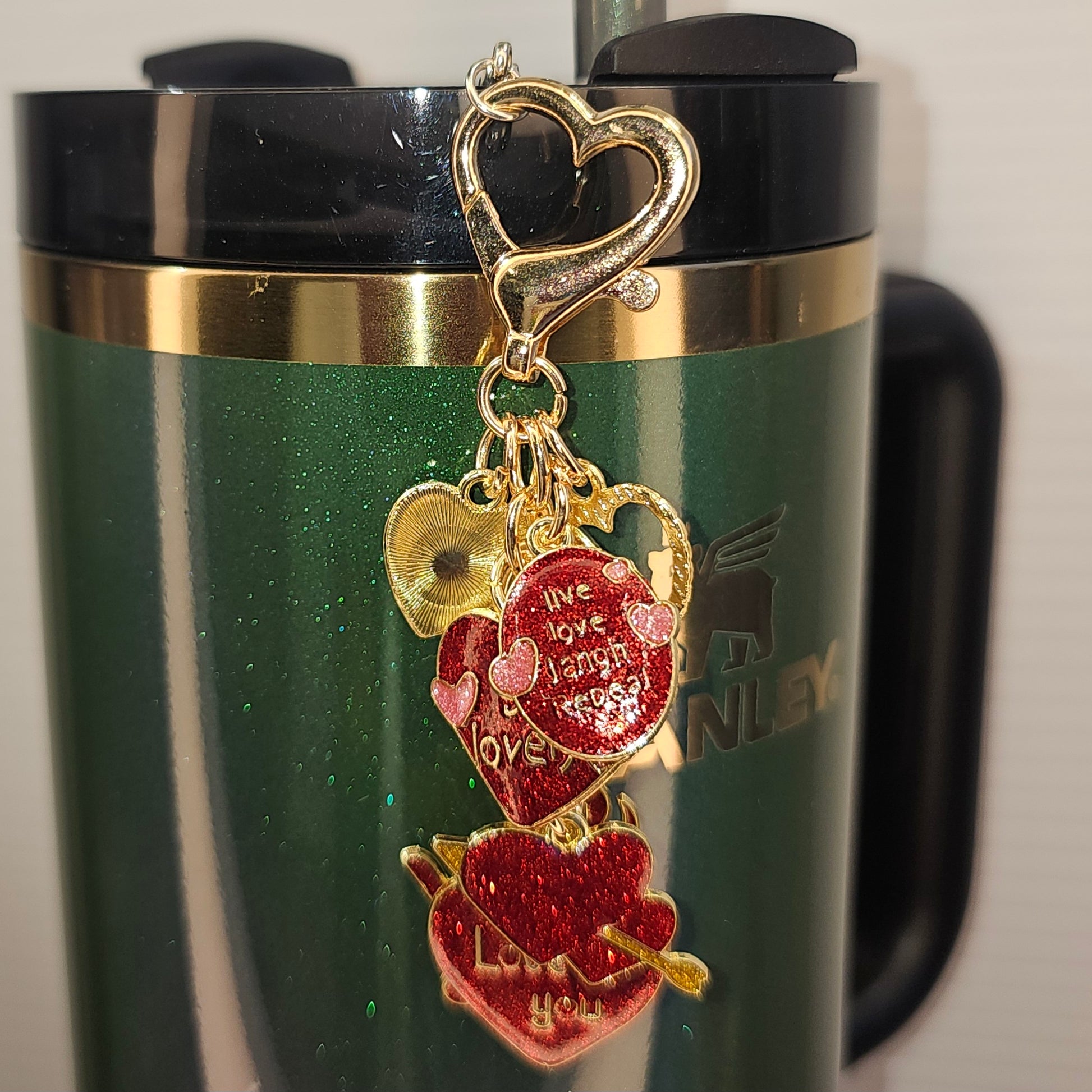 Valentine's Day Tumbler Straw Charm  - Love You. Red, Pink, and Gold Glitter Hearts Valentine's Day Straw Charm  - Straw Dangle. Imaged on Stanley's Wicked Elphaba tumbler. 