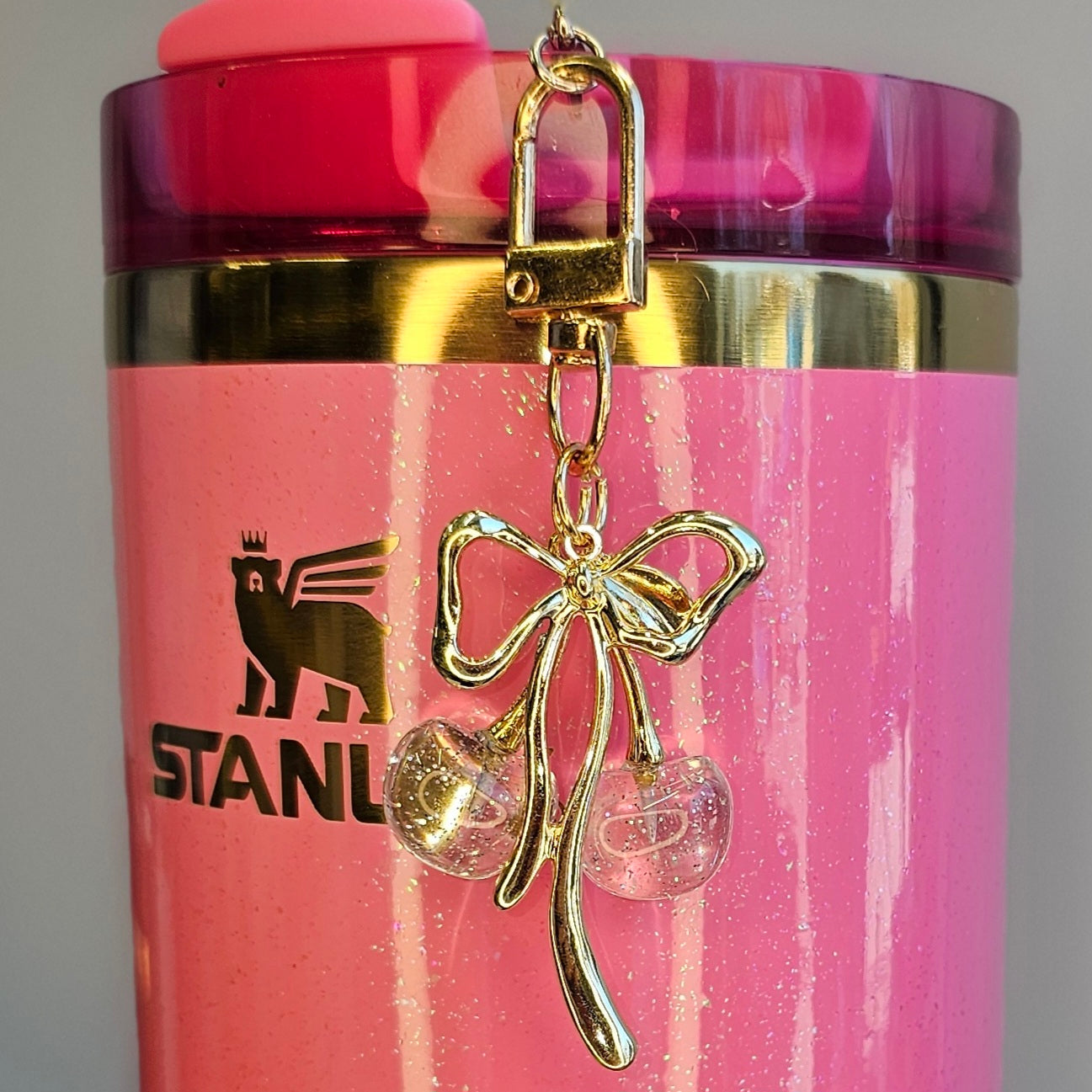 Clear Glitter Cherries and Gold Ribbon Bow Tumbler Straw Charm. 