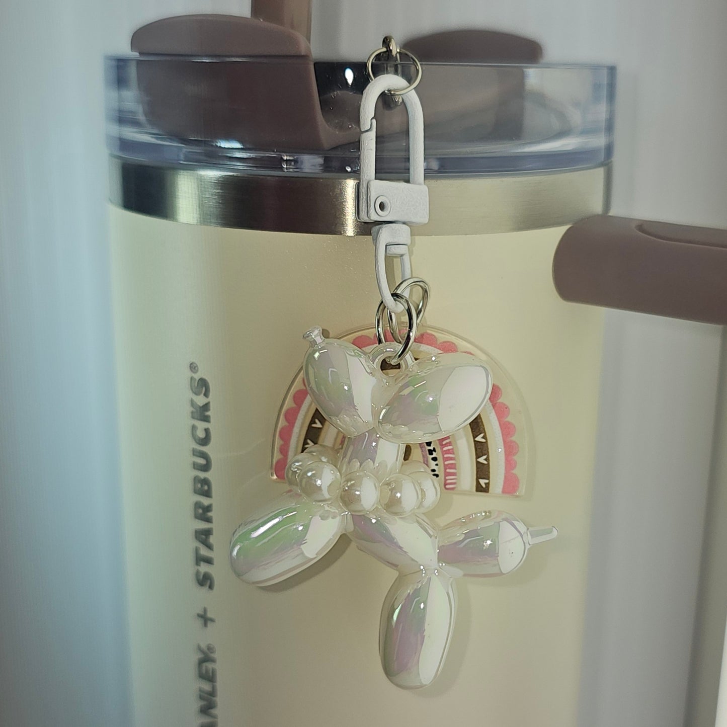 Iridescent Pearlescent Pearl white Balloon Dog w/ Rainbow Charm For Stanley Tumbler Straw charm. Rainbow is pink and brown. 