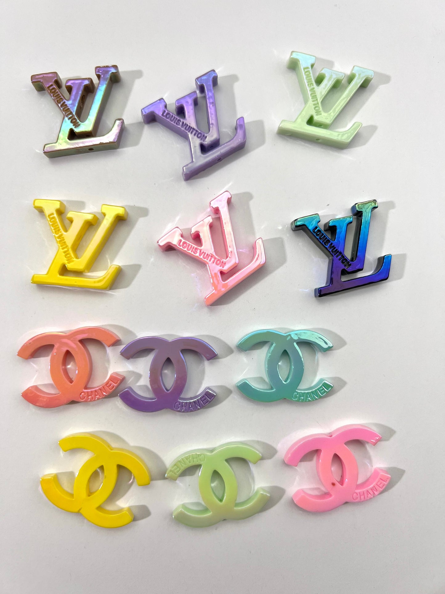 Designer logo beads and plates