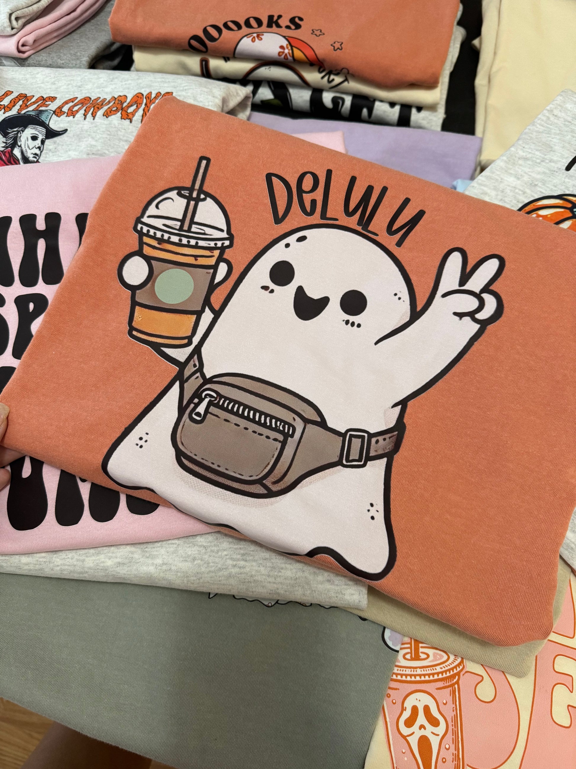 Orange and white Delulu Ghost Tee & Sweatshirt