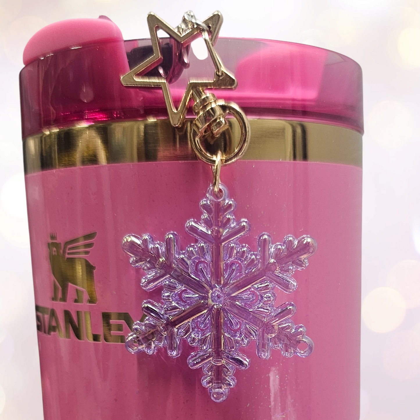 Pearlescent purple Snowflake tumbler straw charm with gold star clasp. 