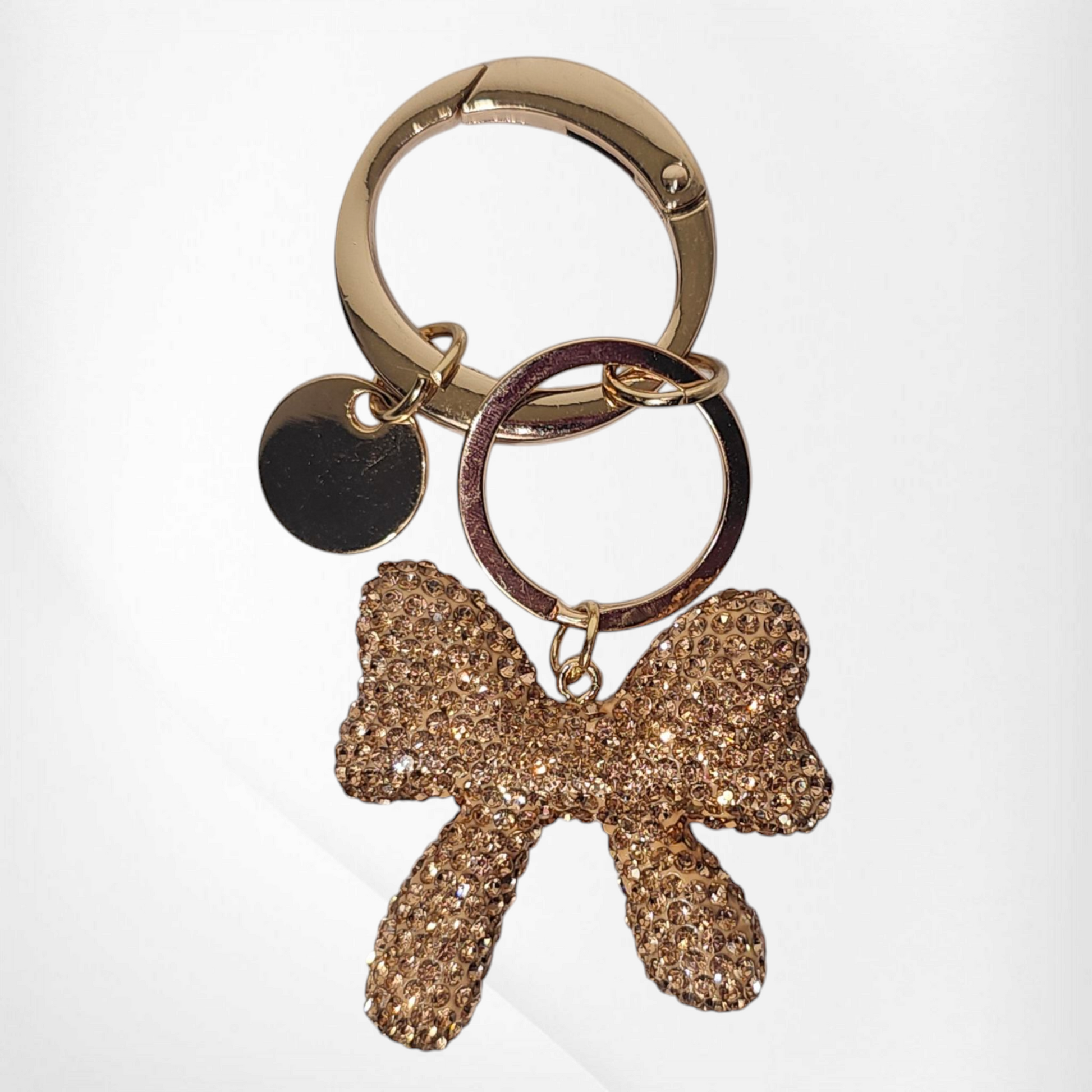 Gold Glitter Ribbon Bow Tumbler Charm. Can be used as a straw charm or cup handle charm. Image shows all keyrings that are included. 