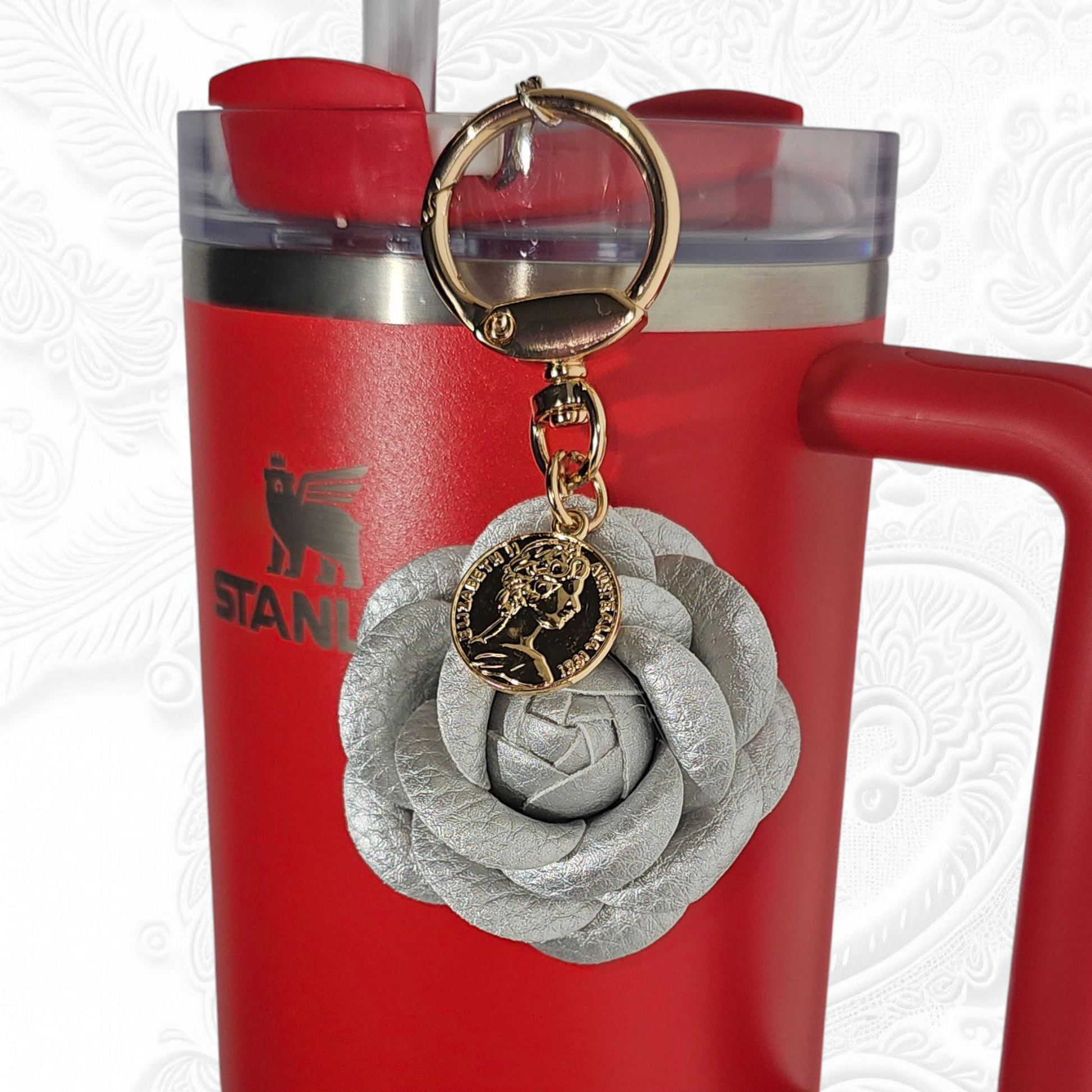 Luxury Silver Camelia flower with gold swivel keyring tumbler straw charm. 