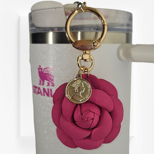 Camelia Pink Camelia flower with gold swivel keyring tumbler straw charm. 