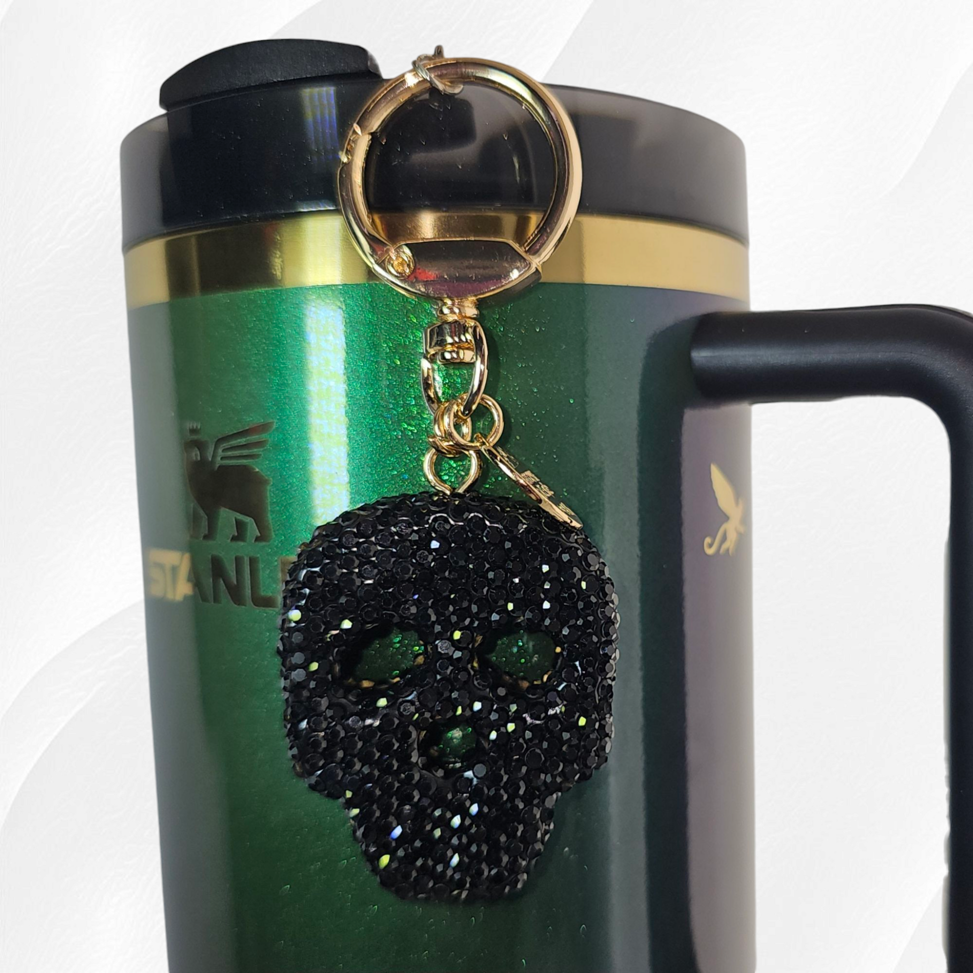 Black glitter Skull Charm with gold swivel keyring tumbler straw charm. 