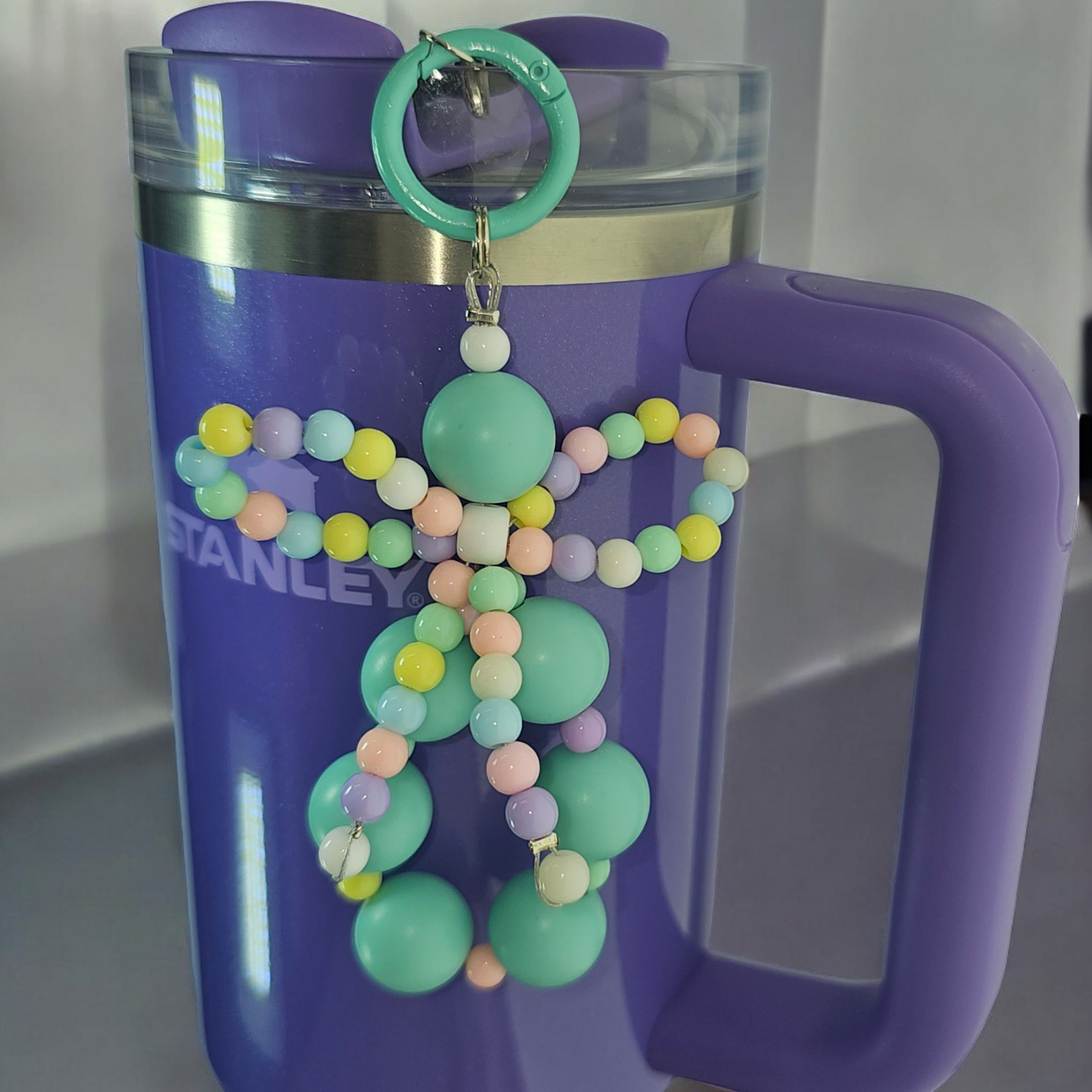 Jump mint Green beaded charm pendant with multicolor pastel beaded ribbon bow tumbler charm. 