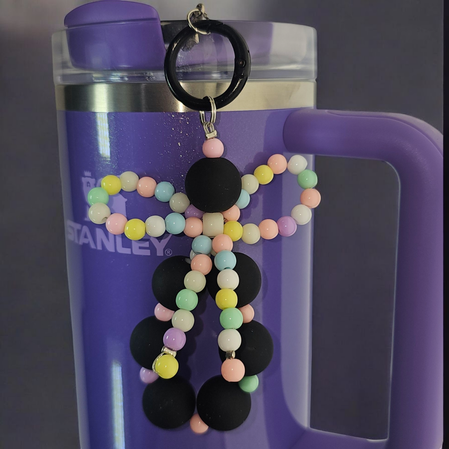Jump black beaded charm pendant with multicolor pastel beaded ribbon bow tumbler charm. 