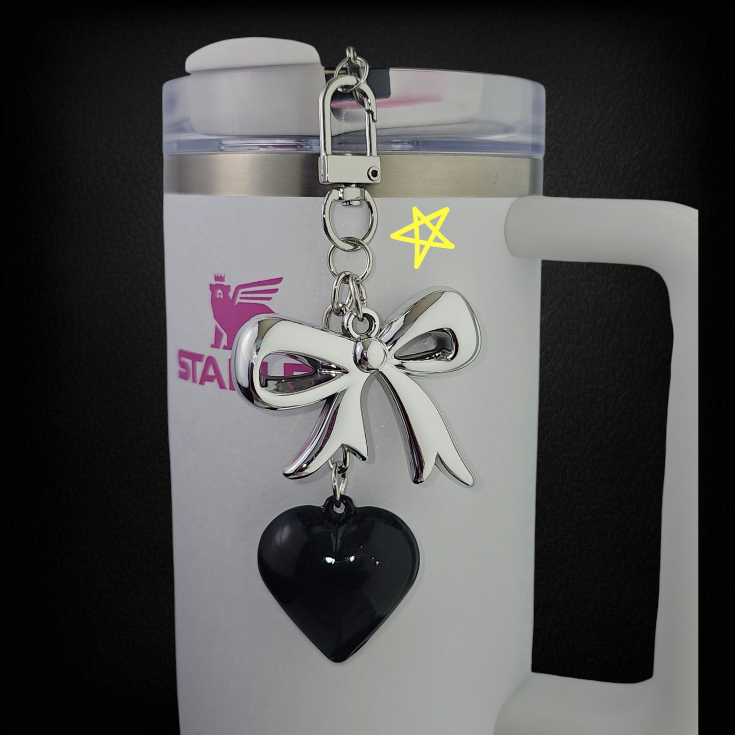 Ribbon Bow and Heary Tumbler Charms  - Silver andBlack. Can also be used as a purse, bag, keychain, backpack, or cellphone charm. Black heart has blemishes. 