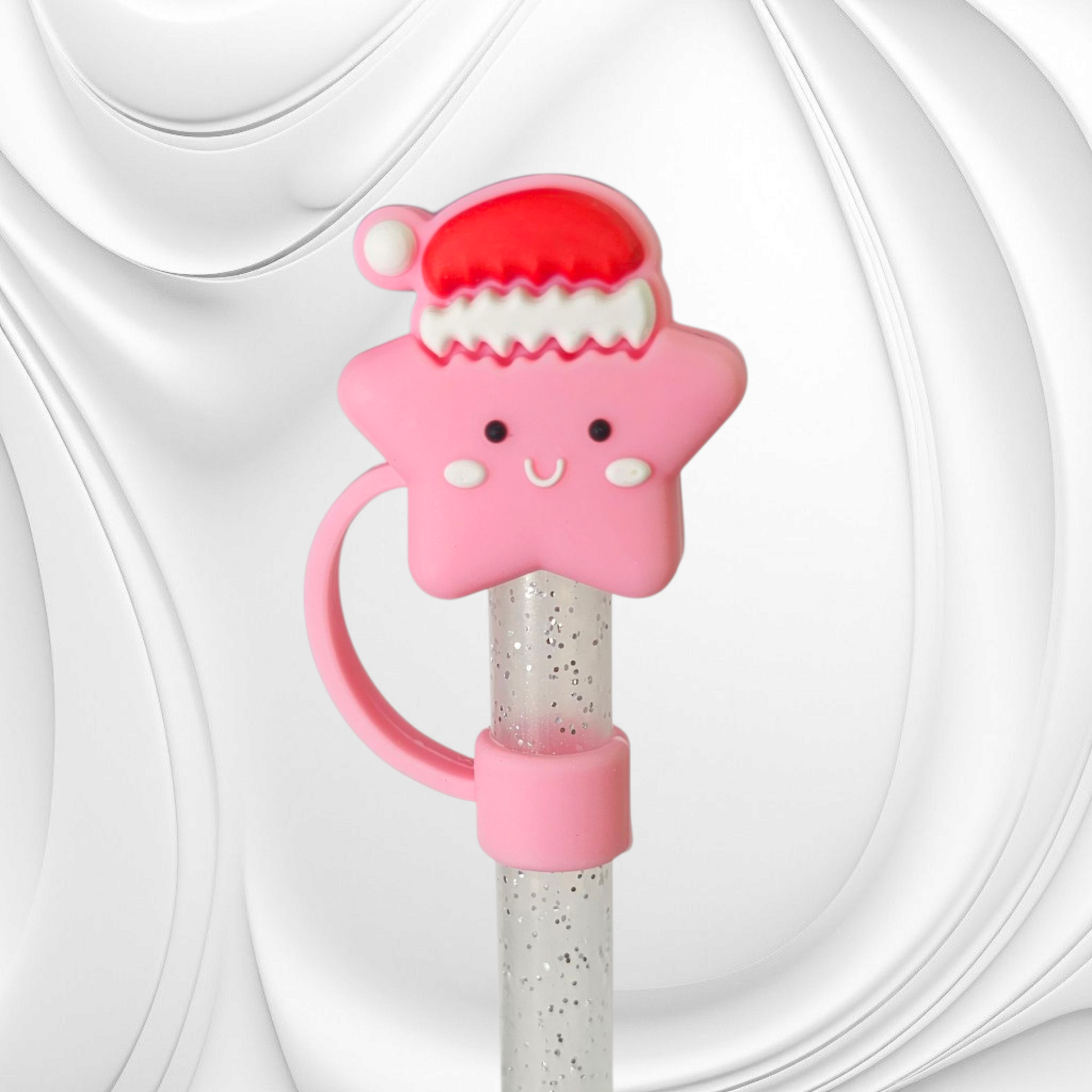 Pink Star wearing red Santa Hat 3D Silicone Straw Topper. 