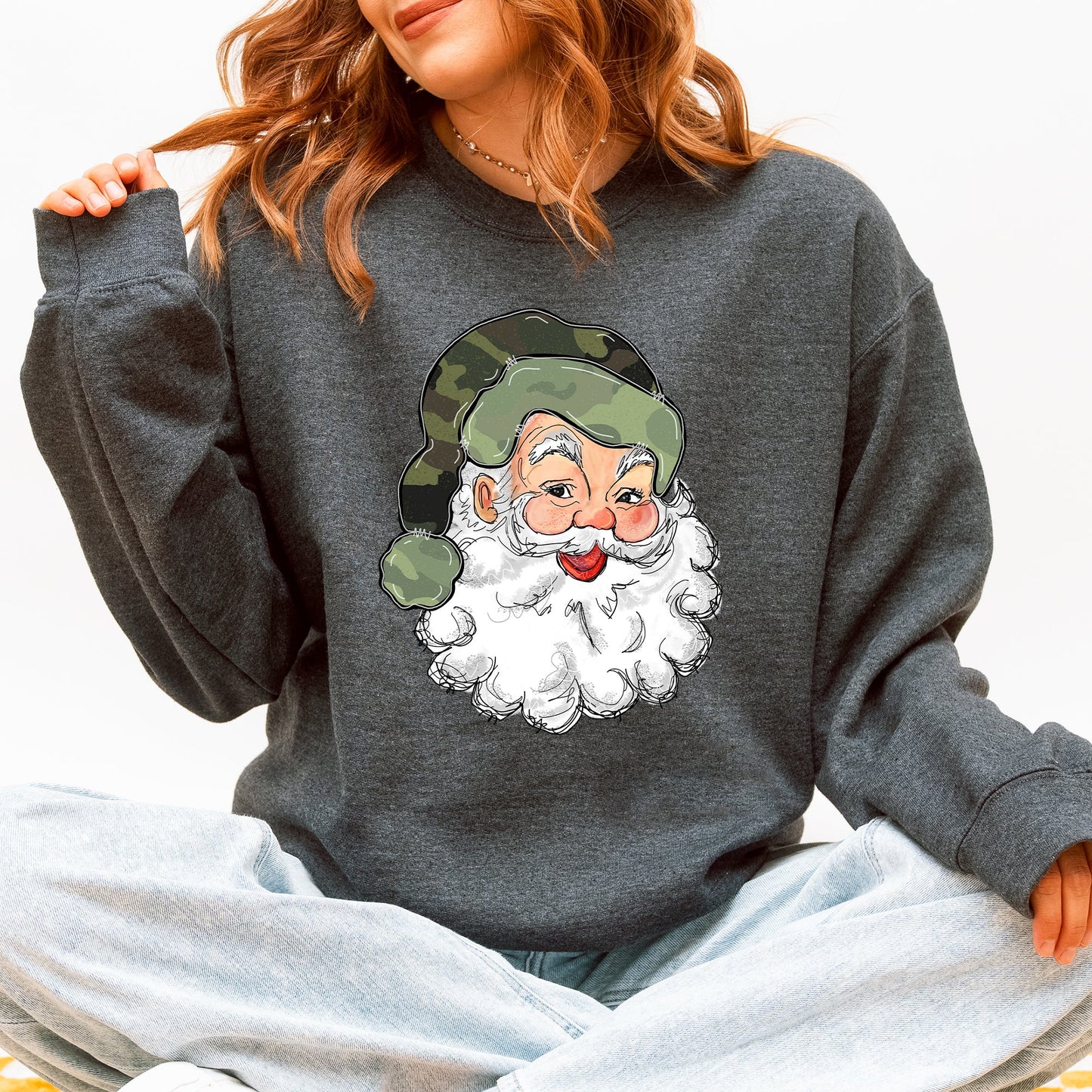 Dark Heather Gray Retro Santa Christmas sweatshirt in cream with green camo hat — cute holiday graphic for winter or hunting lovers.
