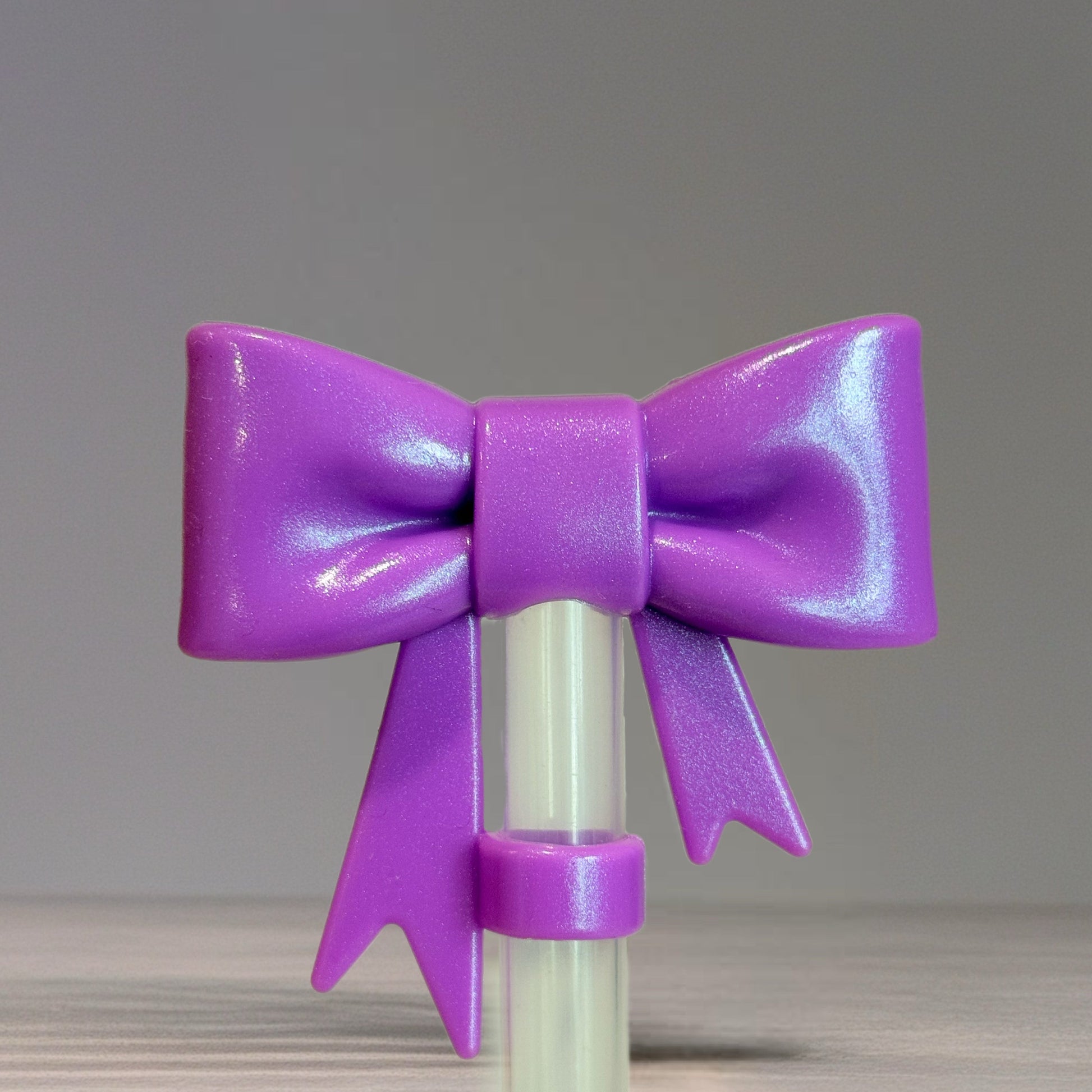 Pulse Purple 3D Bow Silicone 10mm Straw Topper offered by Southern Creative Glamour 