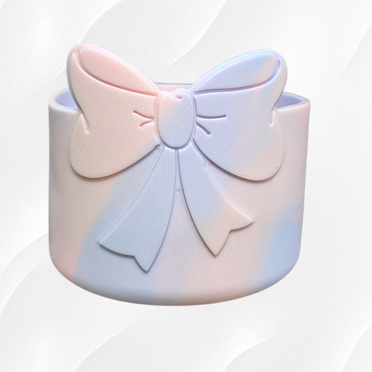 Light peachy pink and periwinkle blue shimmery Bow Silicone Tumbler Boot. 
Cotton Candy Shimmer Tumbler Boot by Southern Creative Glamour 