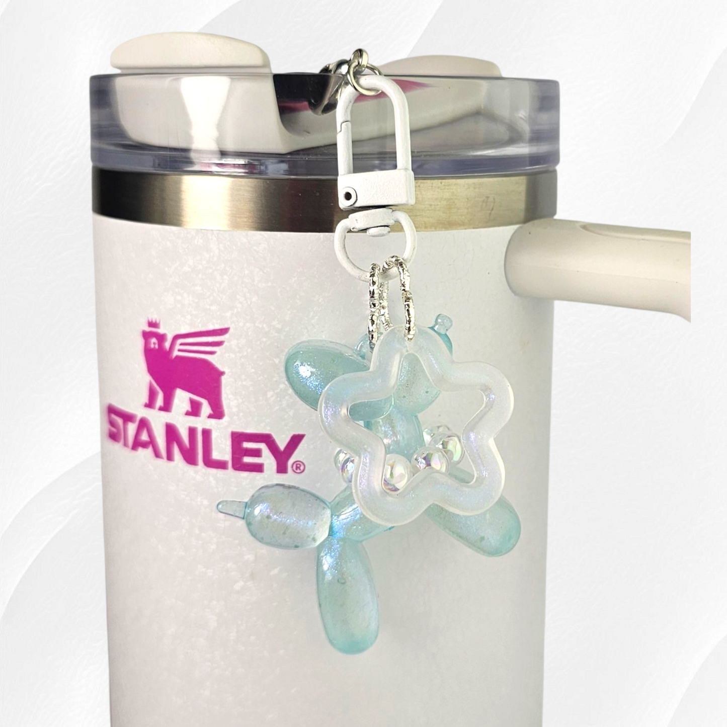 Blue Glow in the Dark Iridescent pearlescent balloon dog and star charm. 