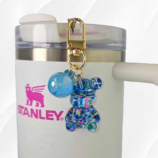 Transparent blue teddy bear with green, pink, and yellow specks. Use as a tumbler, purse, or keychain charm. 