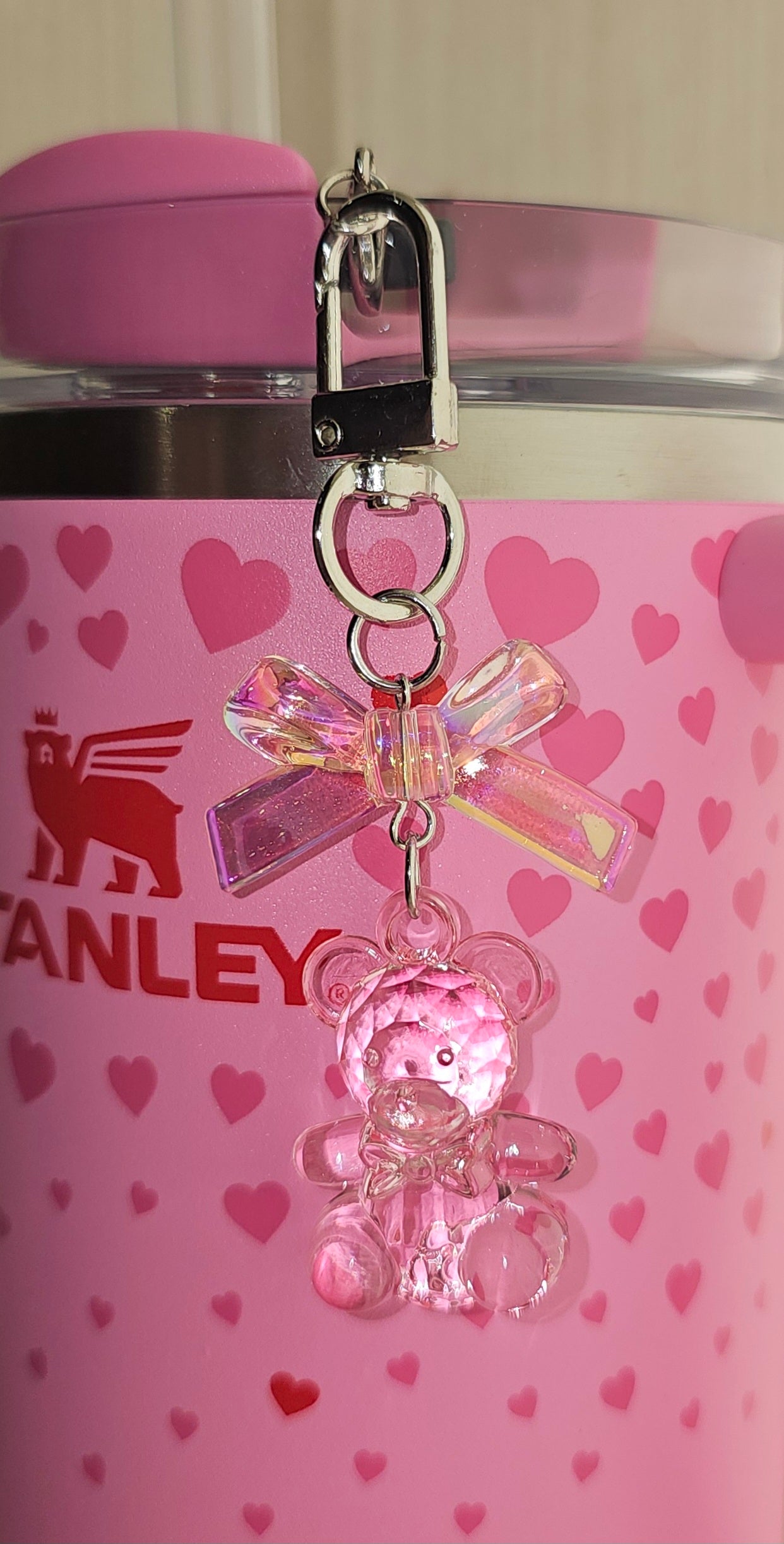 Crystal iridescent pearlescent Sweetheart Pink Coquette Ribbon Bow and Teddy Bear Charm Pendant. Use for straw charm, purse charm, bag charm, keychain charm, or cellphone charm. 