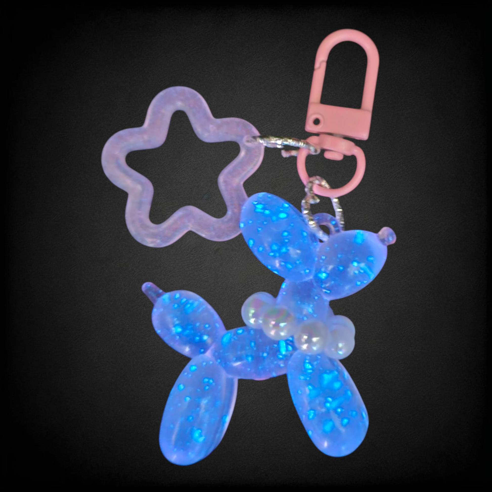 Pink Glow in the Dark Iridescent pearlescent balloon dog and star charm. 