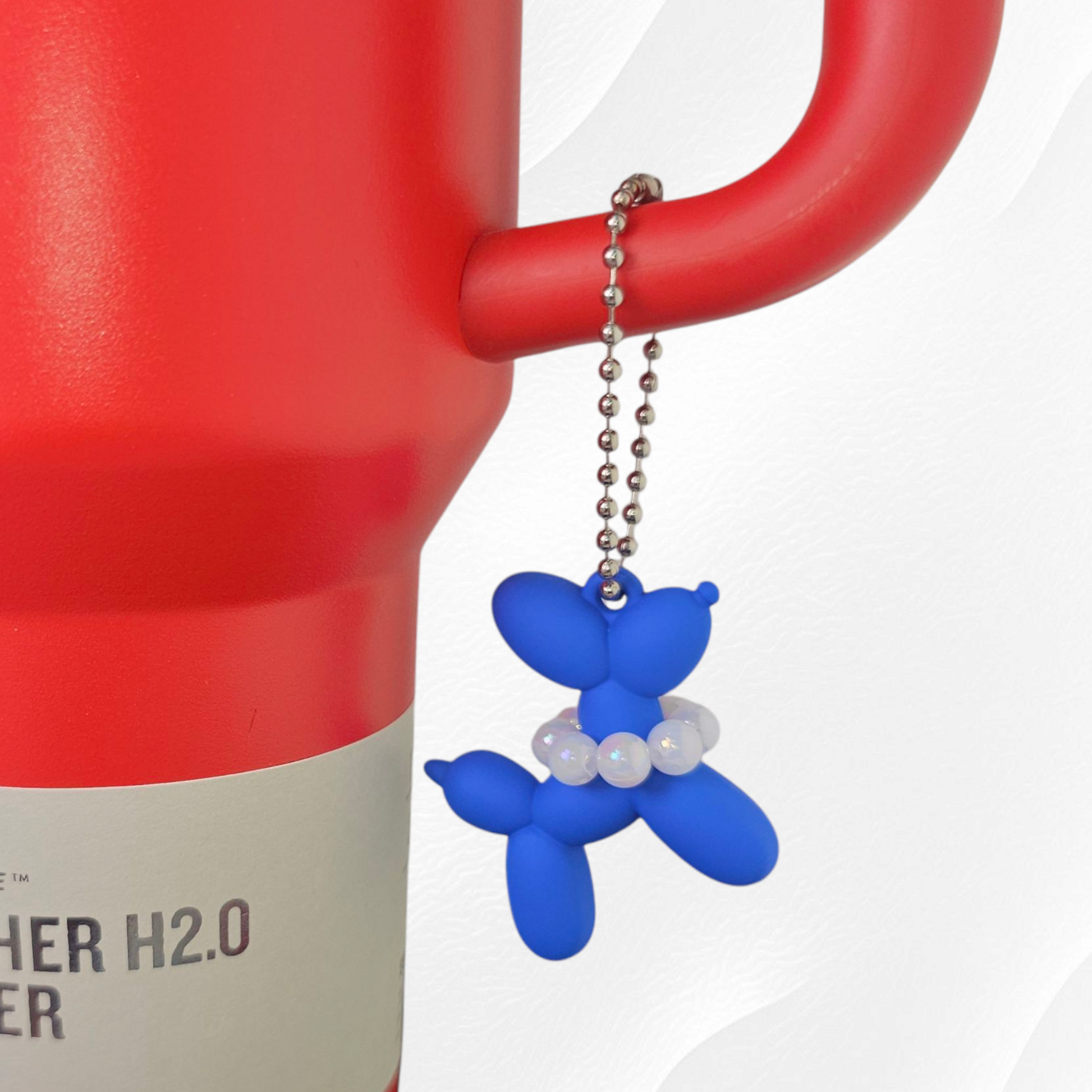 Royal Blue Balloon Dog wearing white pearl necklace cup handle charm. 