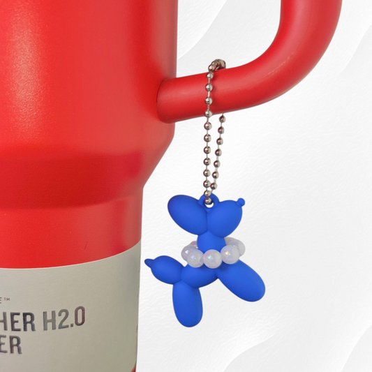 Royal Blue Balloon Dog wearing white pearl necklace cup handle charm. 