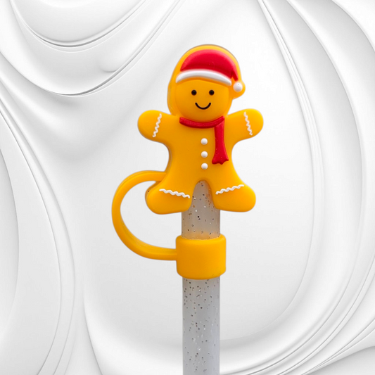 Golden yellow Gingerbread Man wearing red Santa Hat 3D Silicone Straw Topper. 
