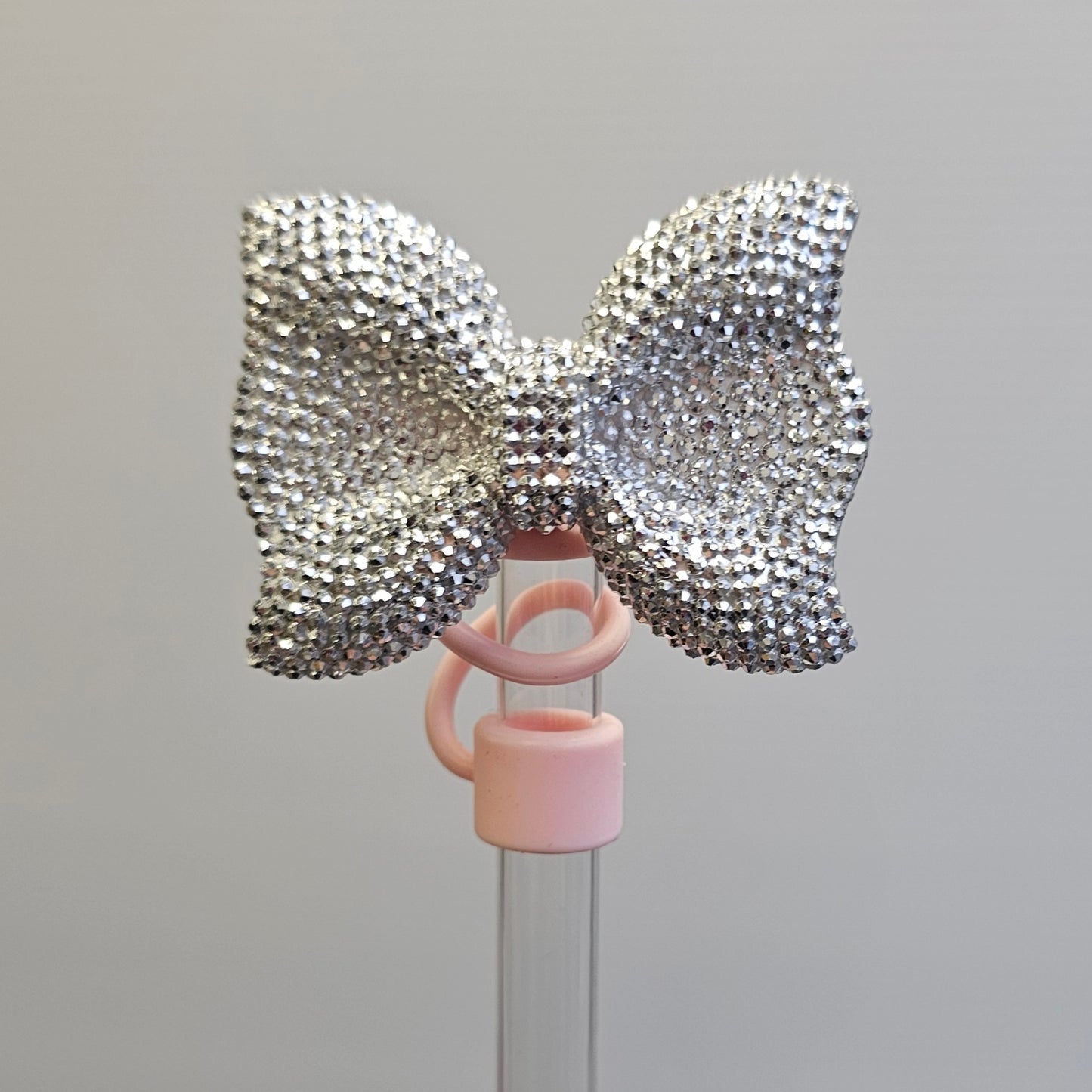 Silver Bow Tie Silicone Straw Topper with light Pink  / Blush Pink Silicone Straw Topper base. 