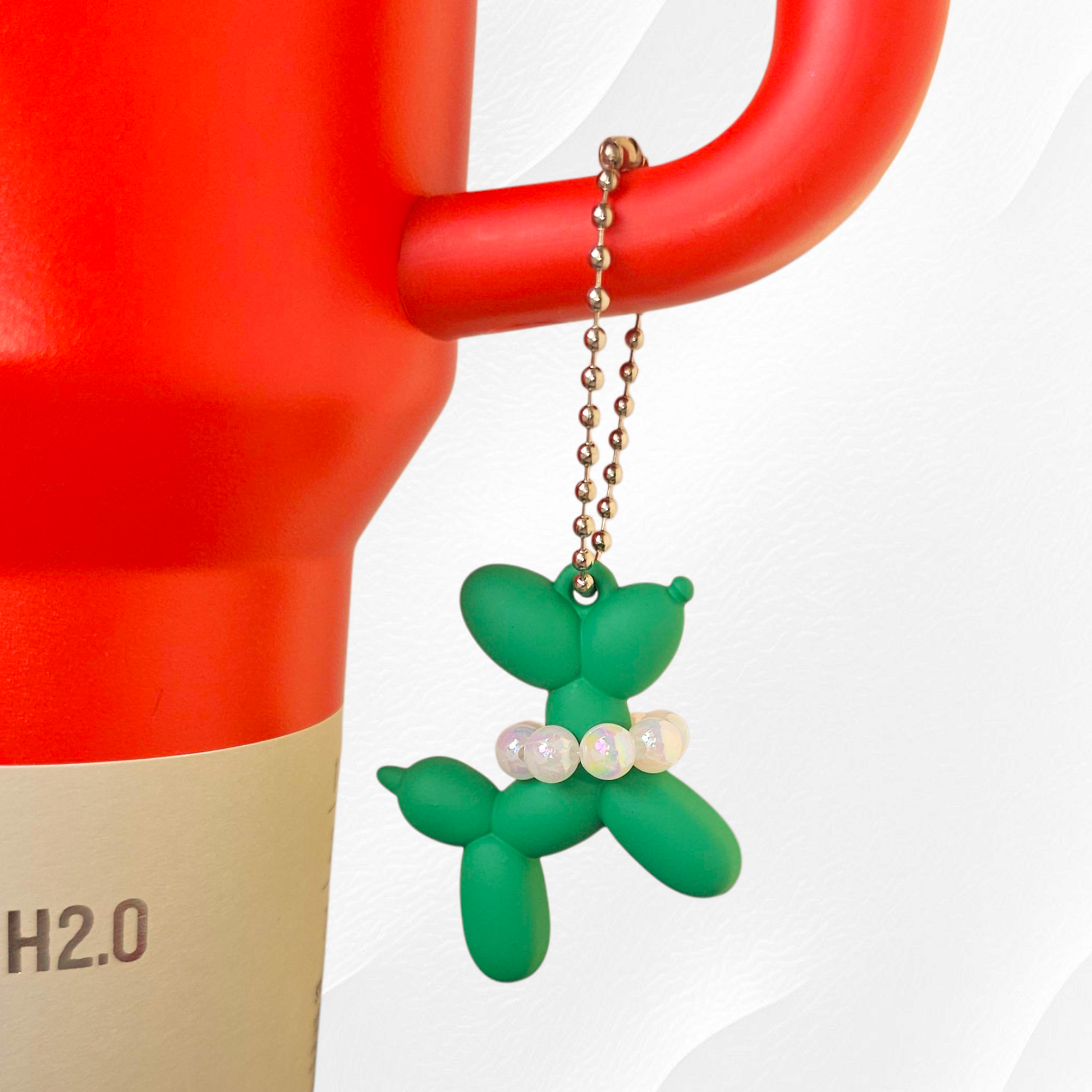 Kelly Green Balloon Dog wearing white pearl necklace cup handle charm. 