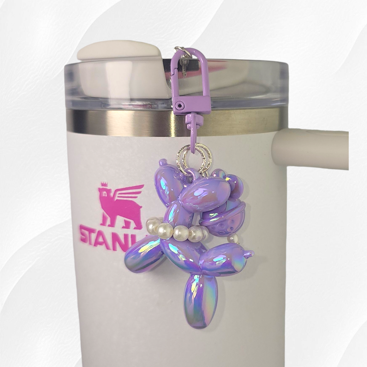 Purple Balloon Dog and bow tumbler charm. 