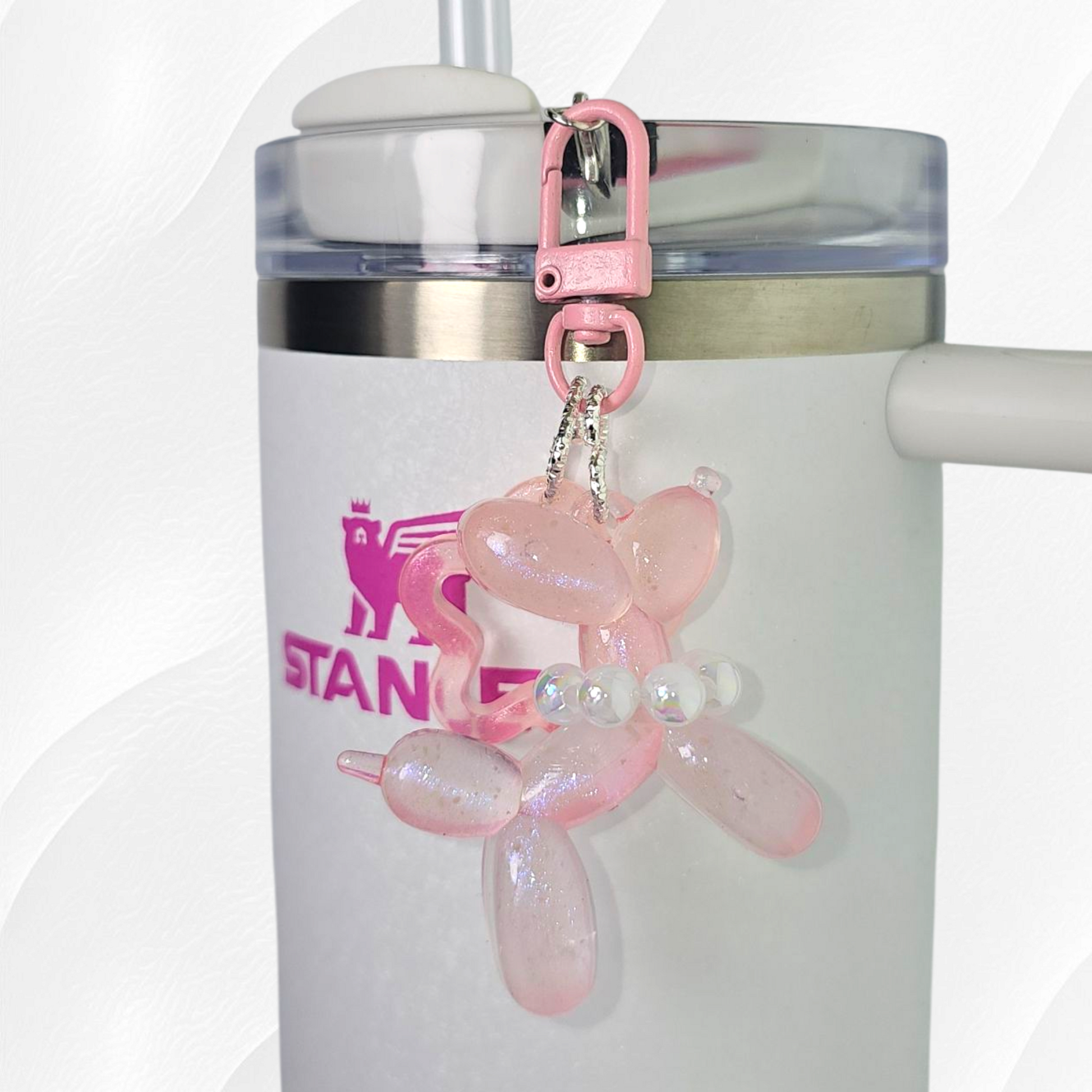 Pink Glow in the Dark Iridescent pearlescent balloon dog and star charm. 